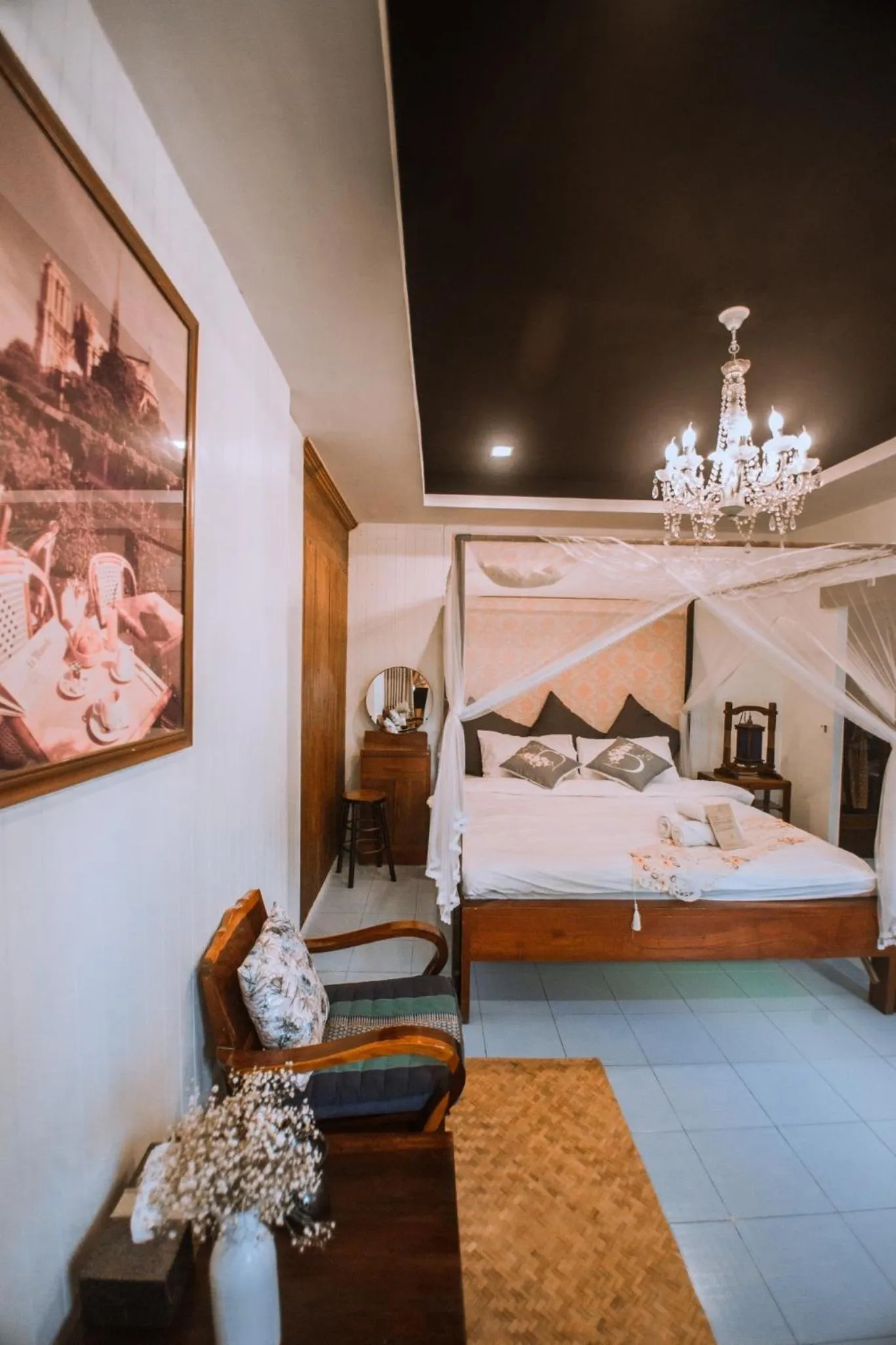 Bed in The Antique Riverside Resort