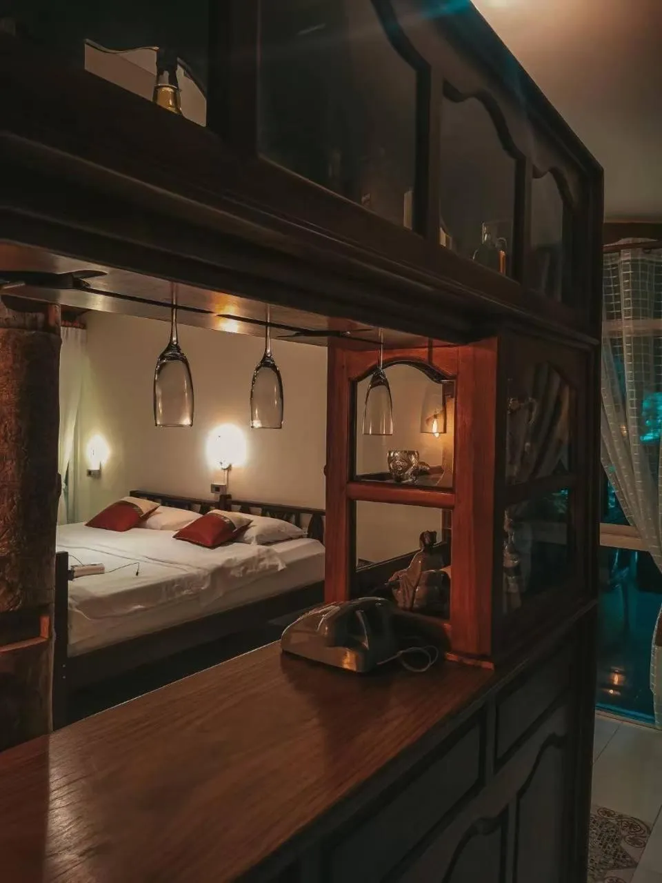 Bed in The Antique Riverside Resort