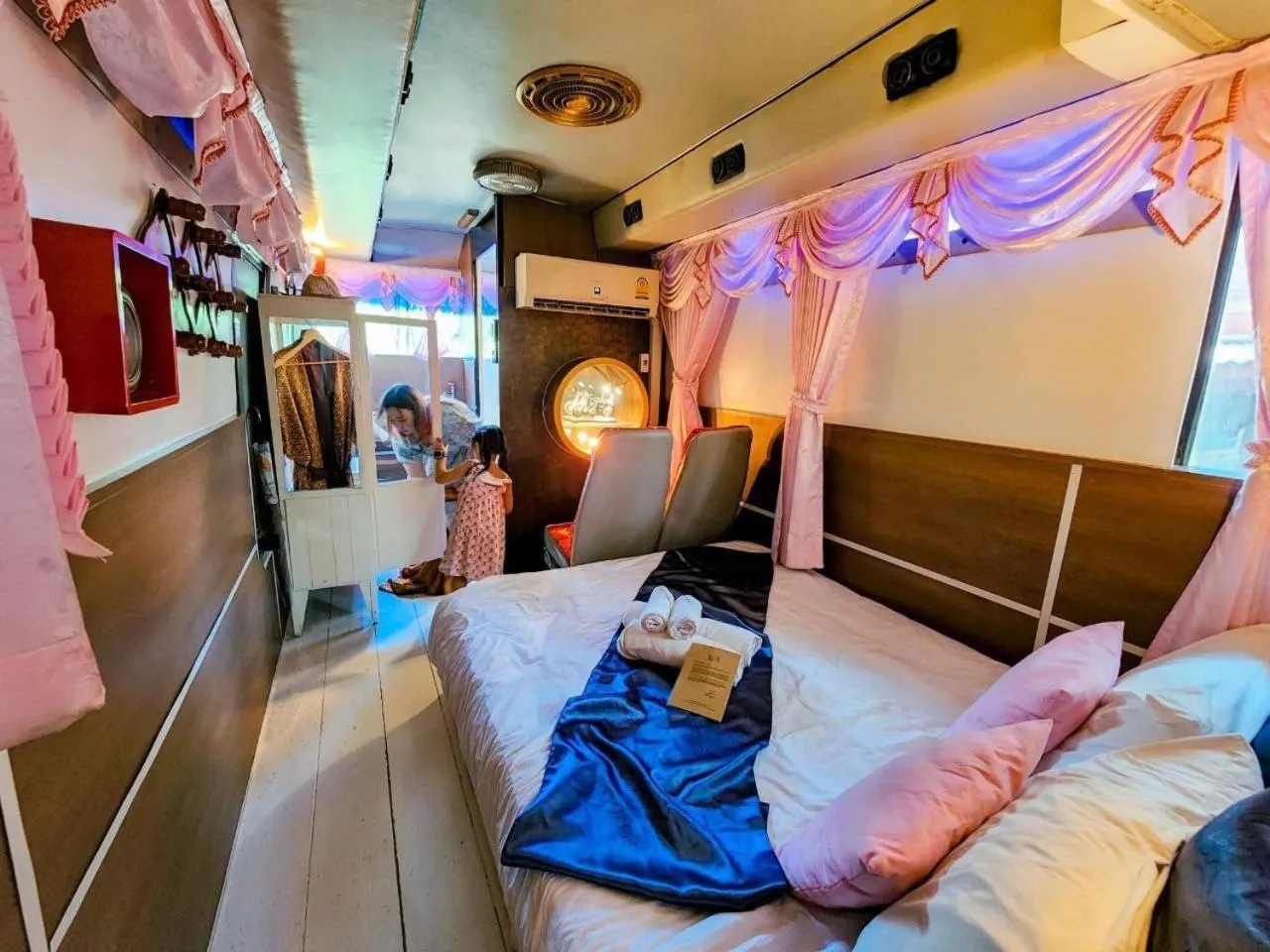 Bed in The Antique Riverside Resort