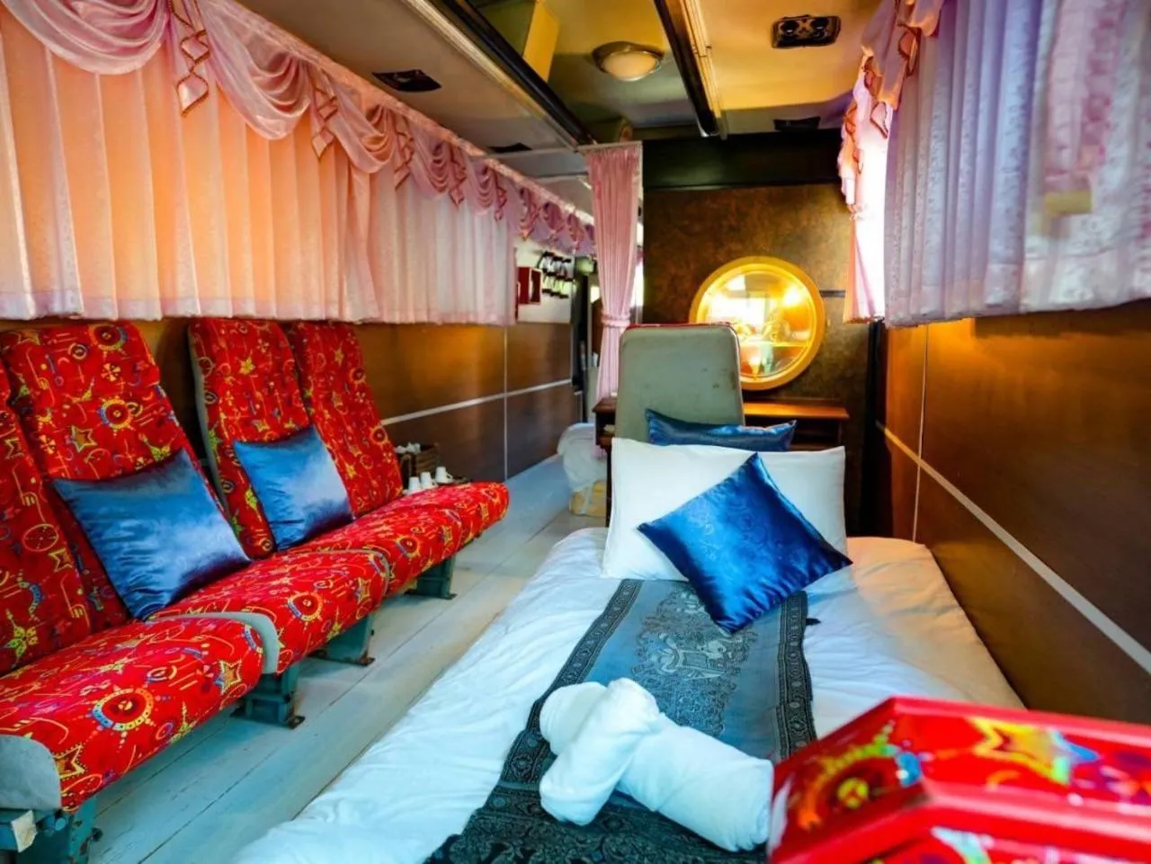 Bed in The Antique Riverside Resort