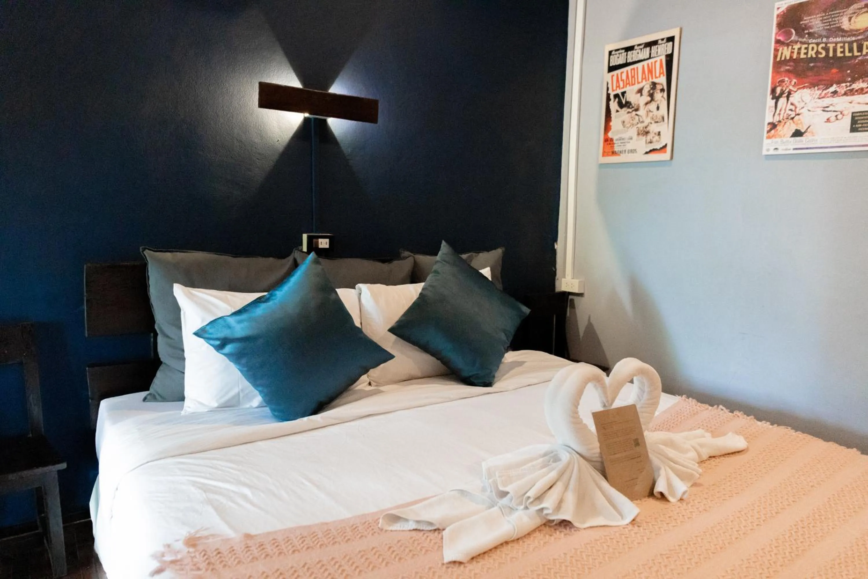 Bed in The Antique Riverside Resort