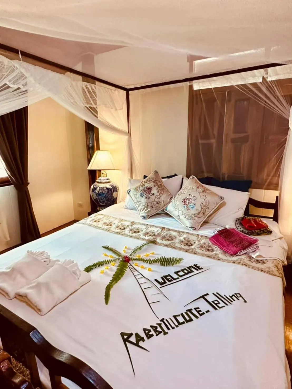 Bed in The Antique Riverside Resort