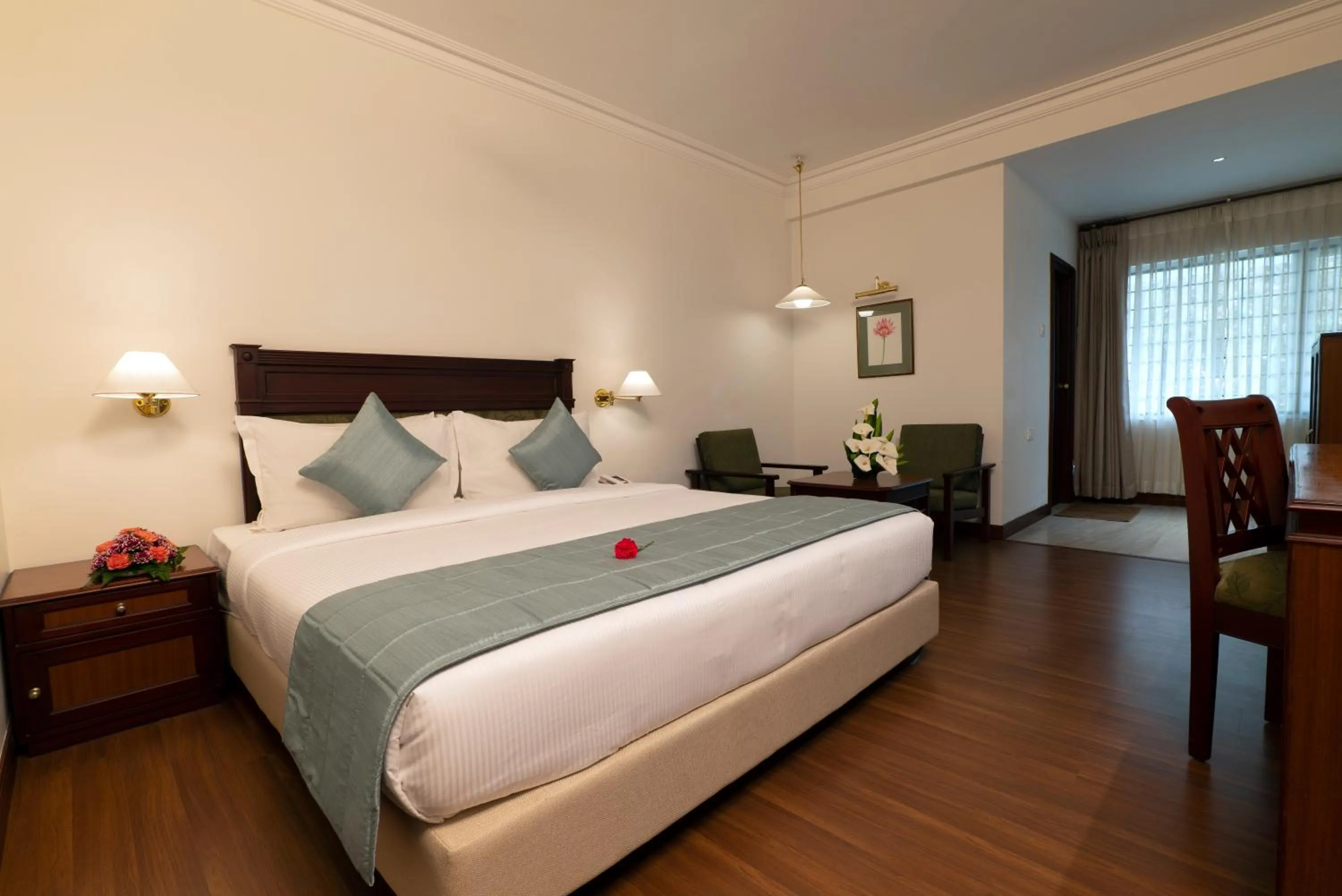 Photo of the whole room, Bed in Issacs Residency