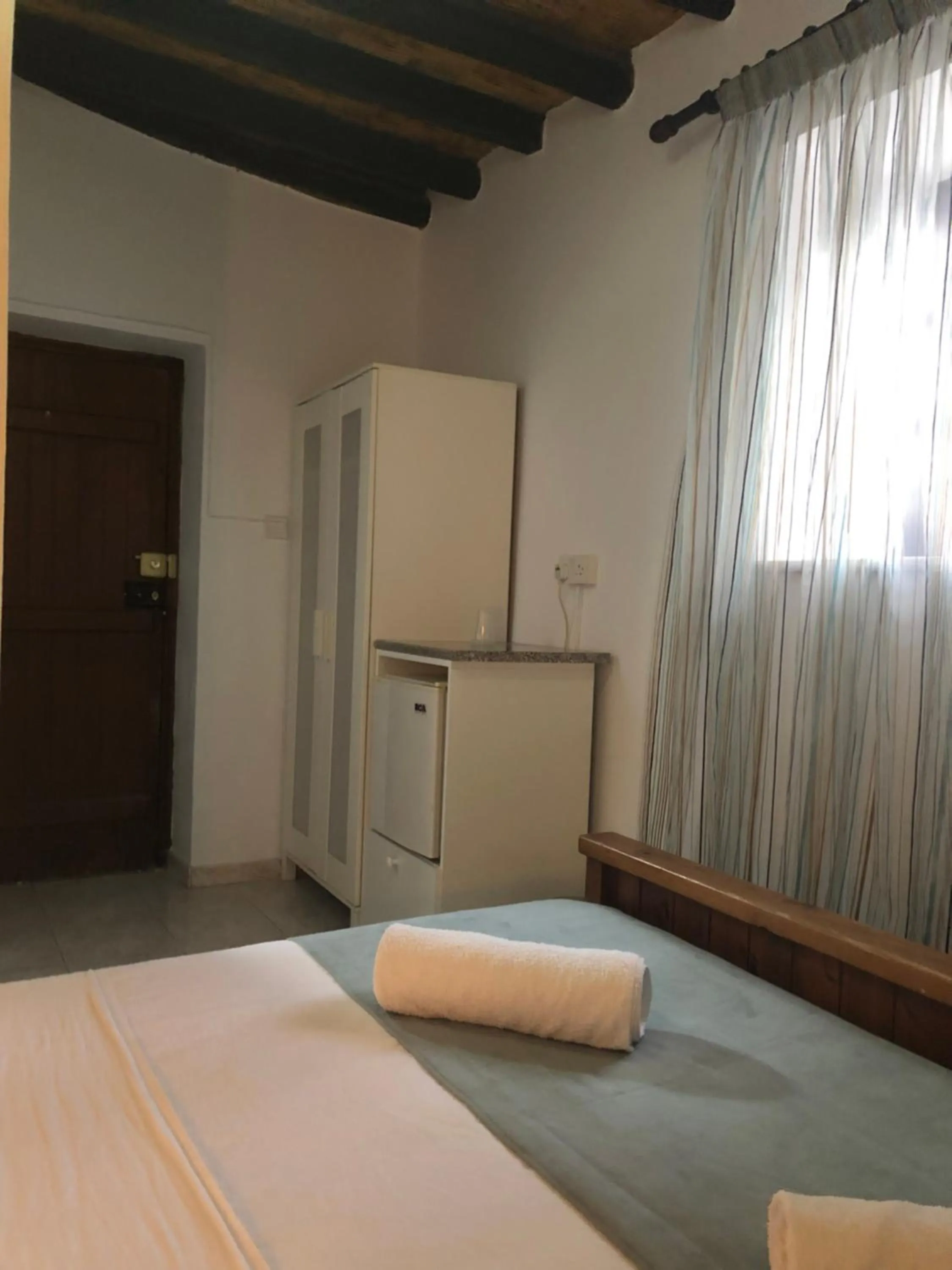 Bed in Villa Thermopilon