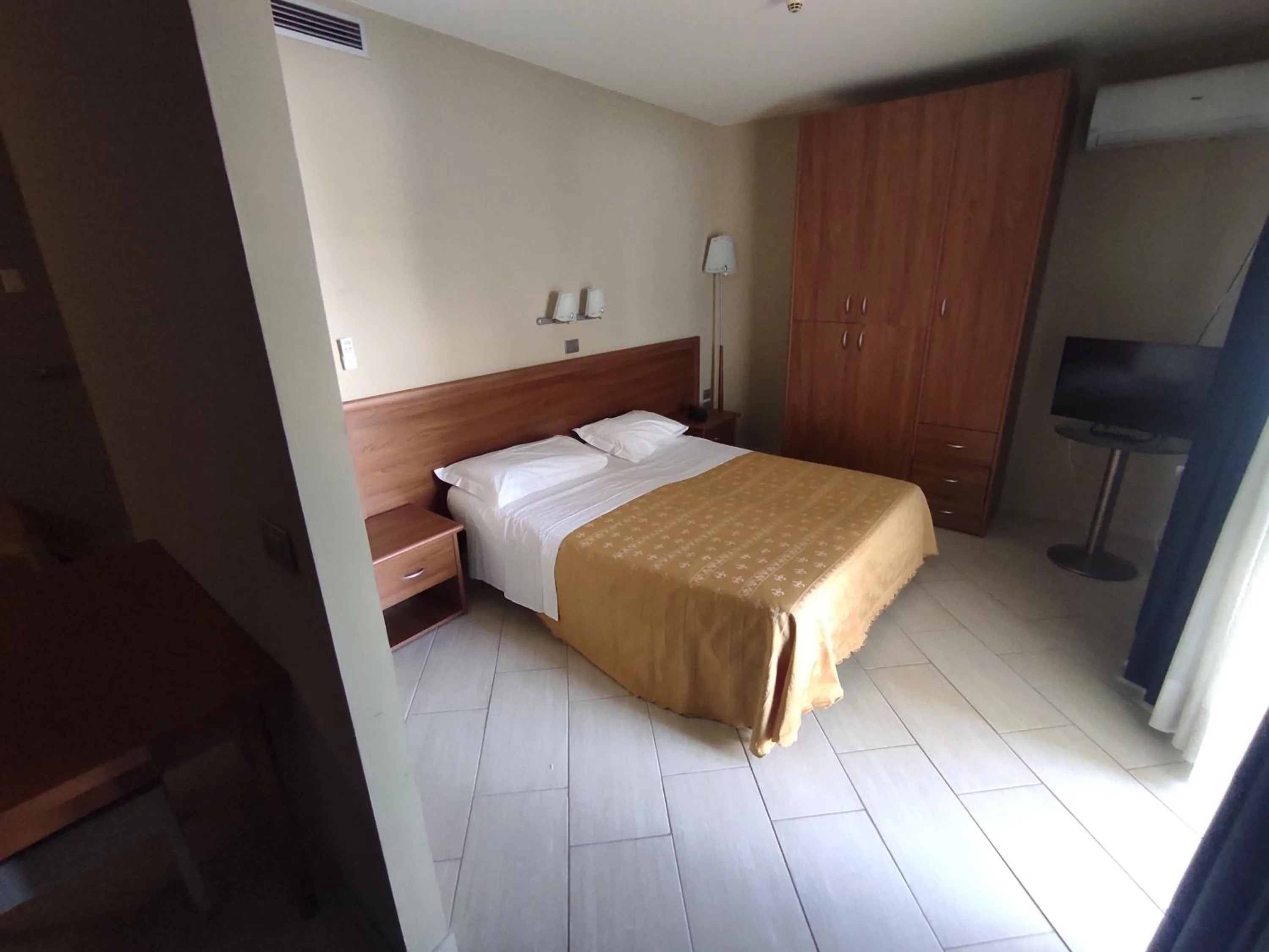 Photo of the whole room, Bed in Standard Hotel Udine