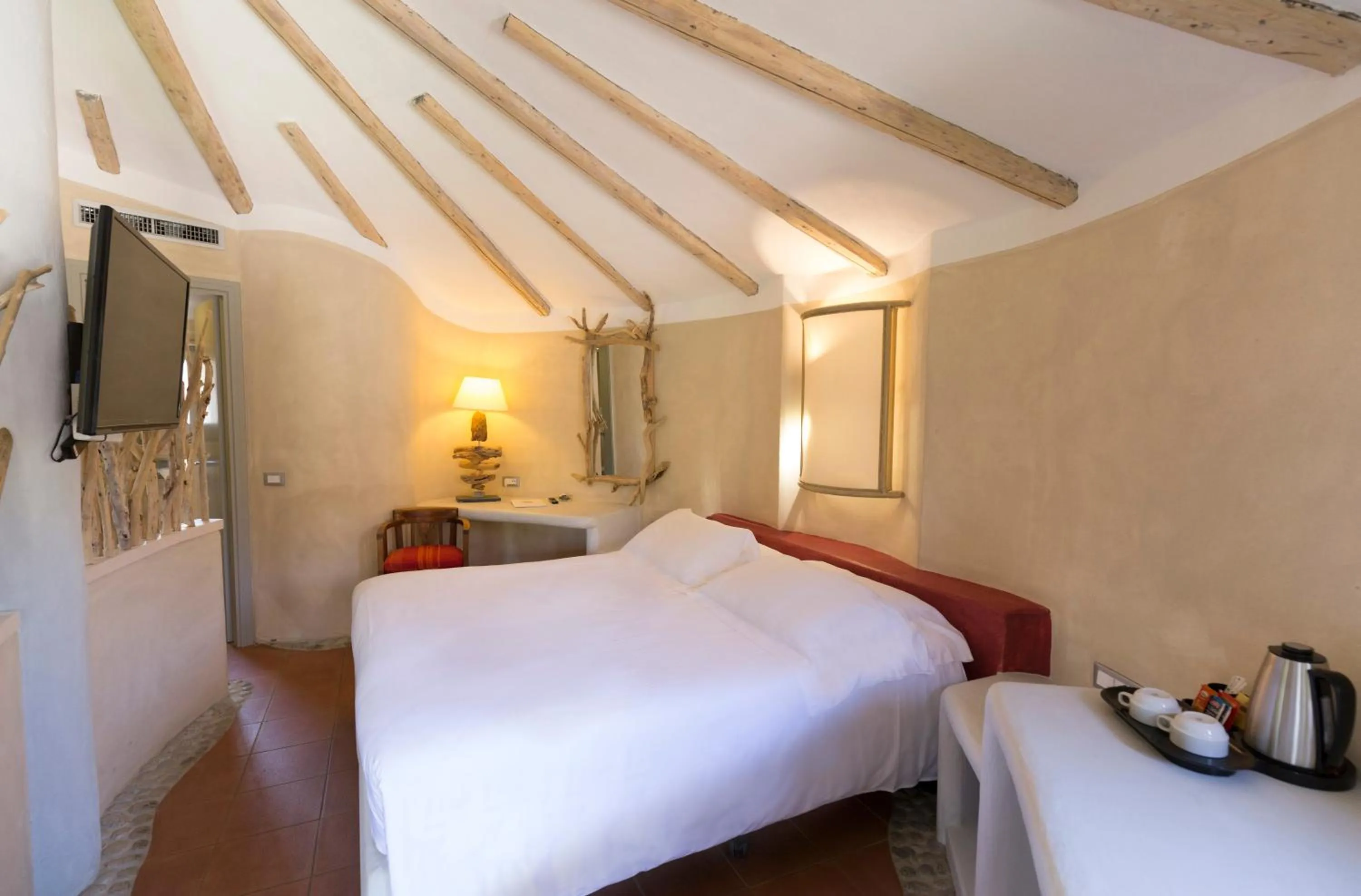 Bed in Baia Del Sole Resort