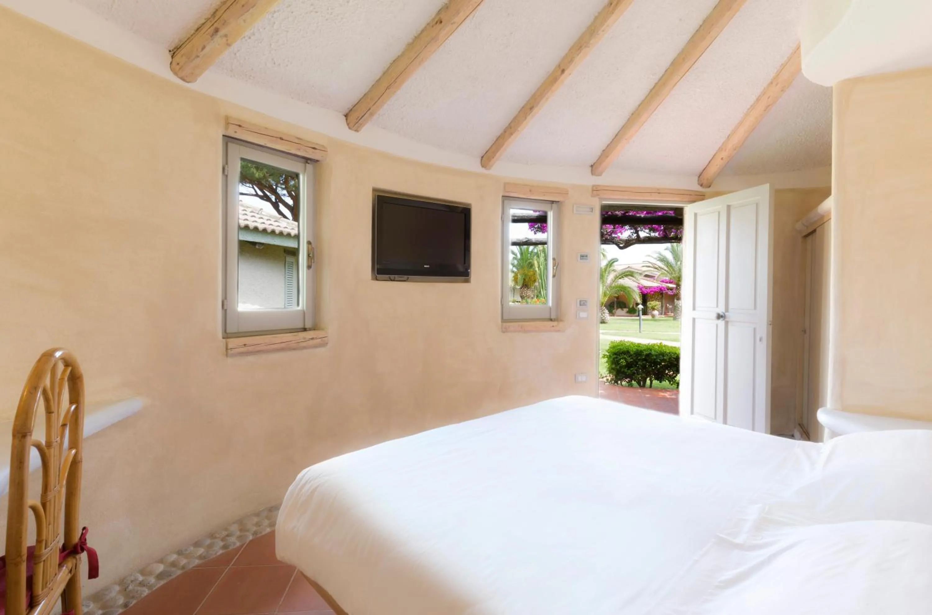 Bed in Baia Del Sole Resort