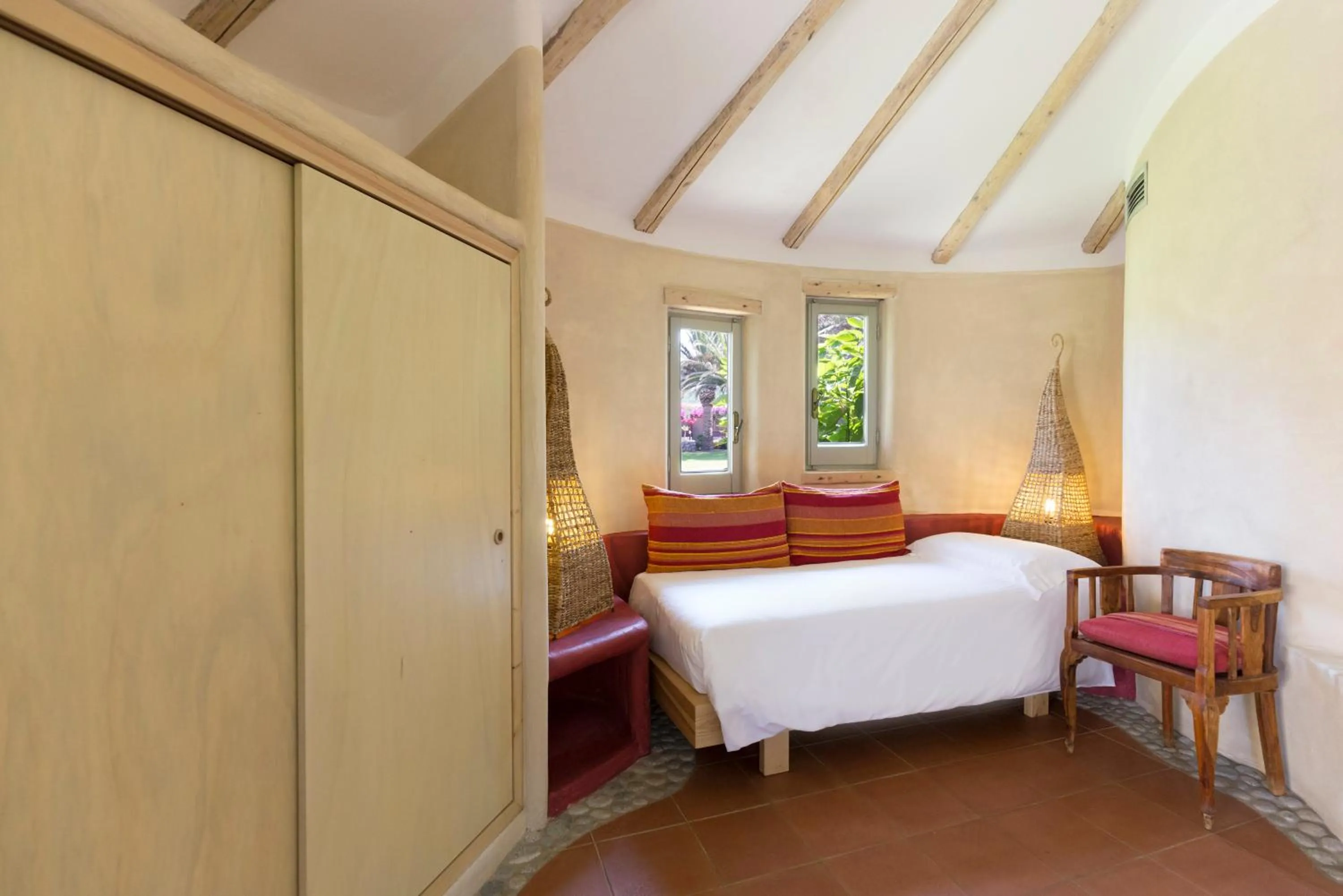 Bed in Baia Del Sole Resort