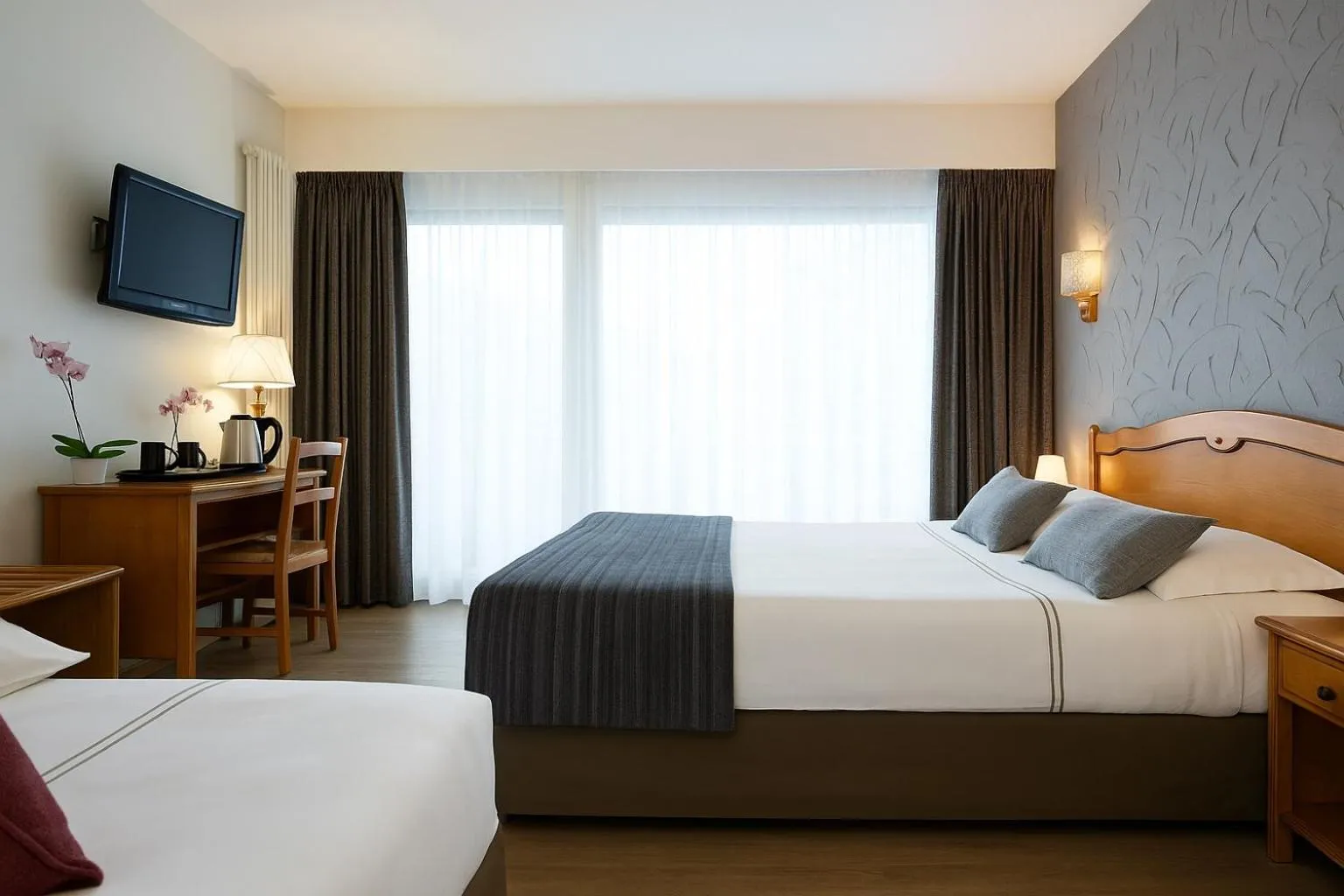 Bed in LOGIS HÔTEL, CHALETS et RESTAURANT LES CHATELMINÉS