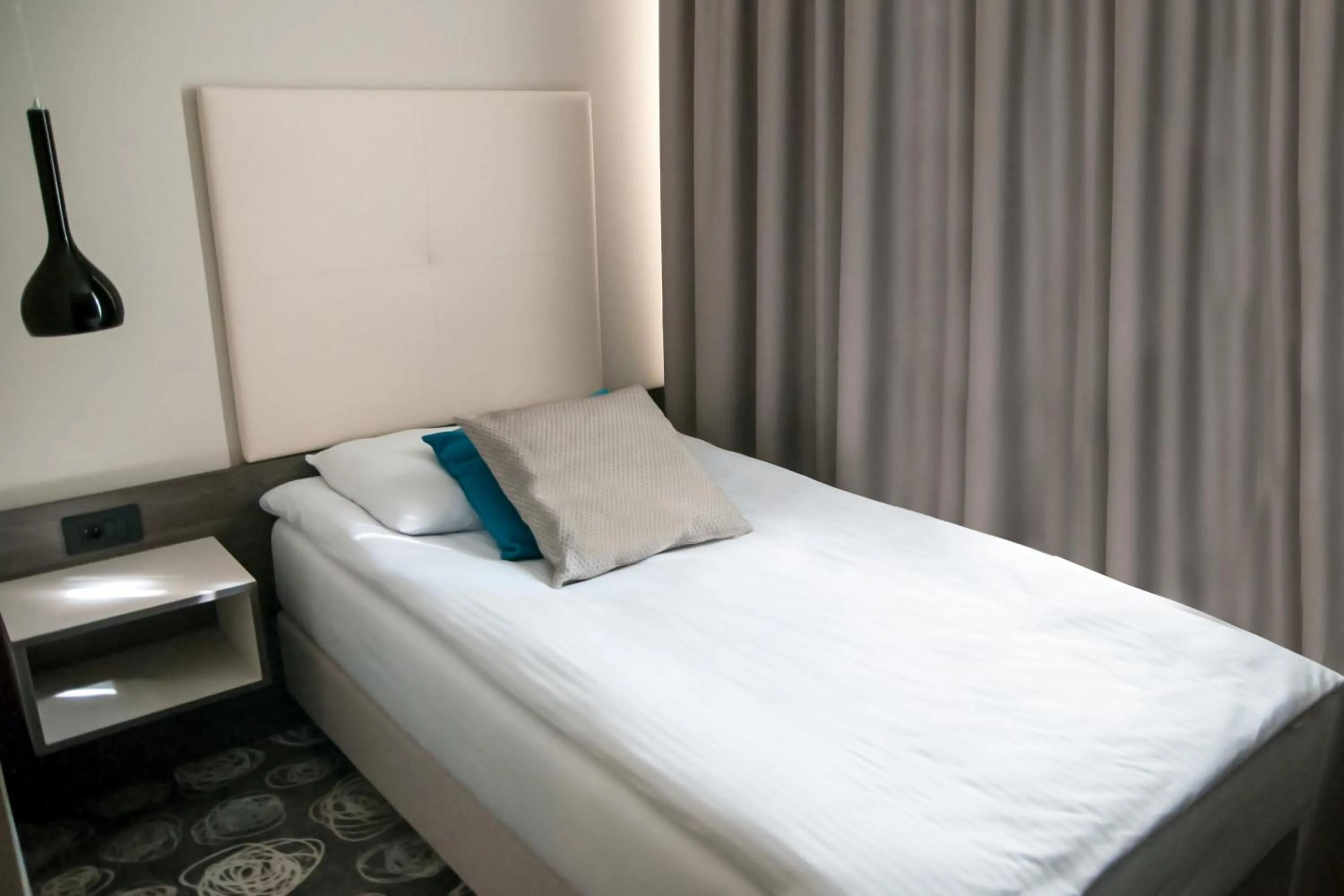 Bed in Hotel Center Novo Mesto