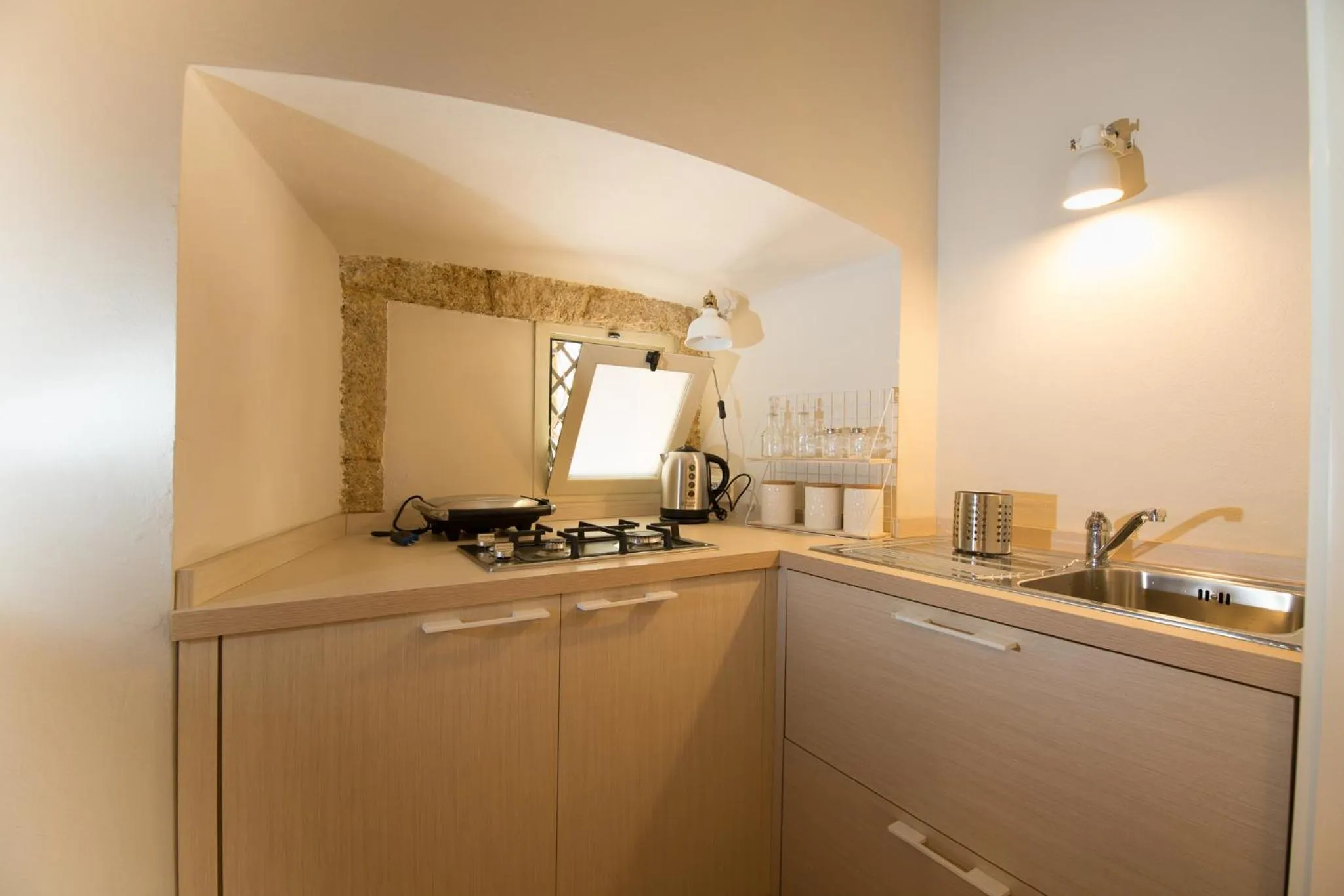 Communal kitchen in Palazzo Taranto Luxury Rooms