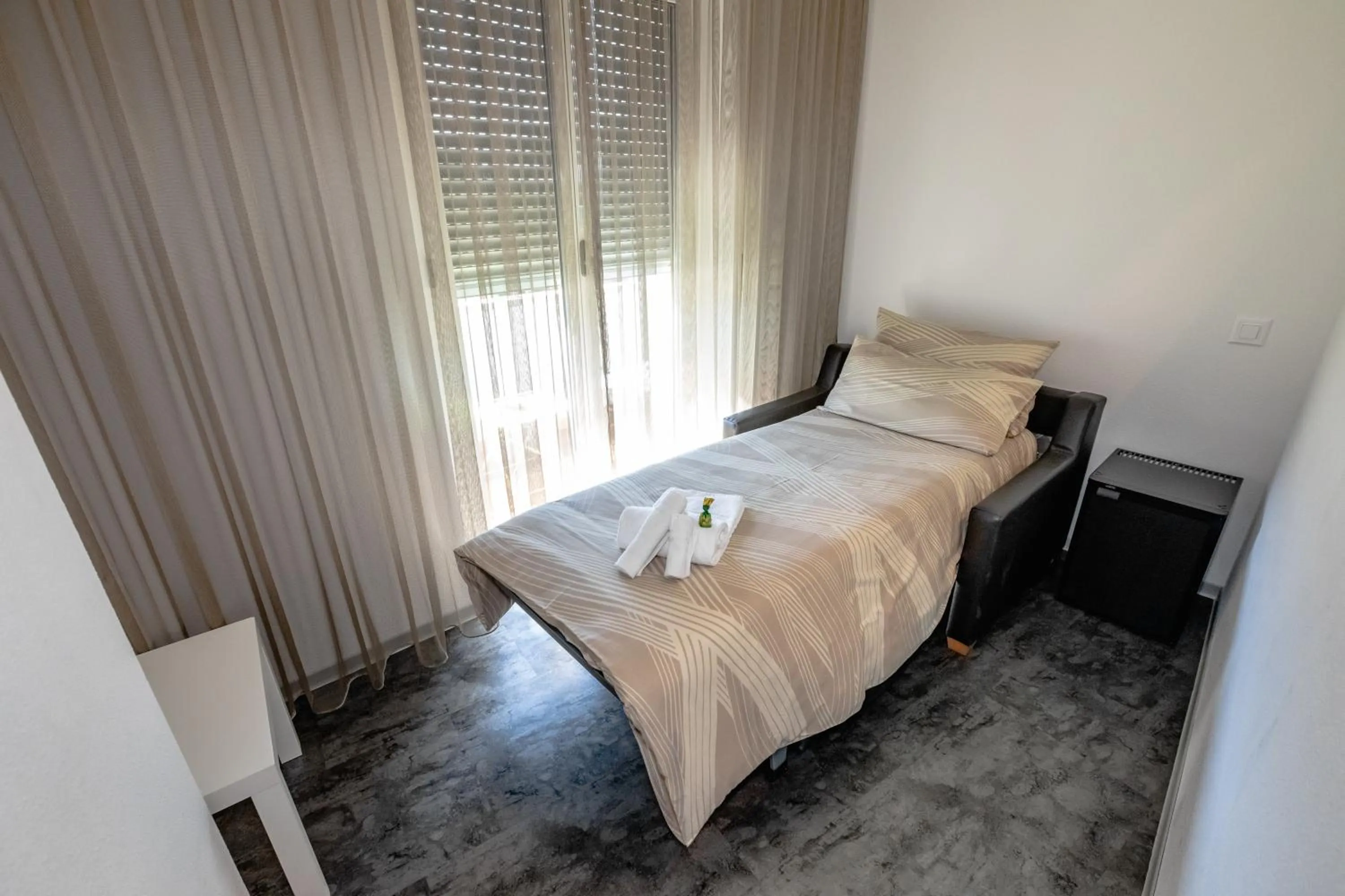 Bed in Albergo Porta Verzasca