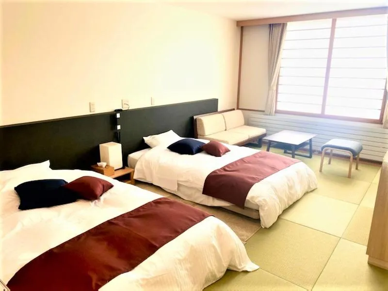 Photo of the whole room, Bed in Tokachi Nauman Onsen Hotel arco