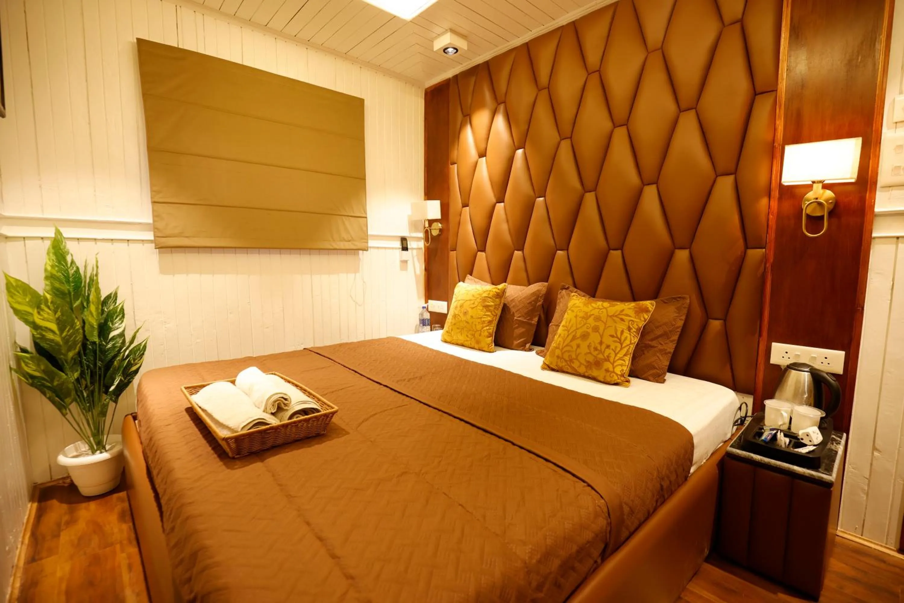 Bed in Walisons Peace Resort