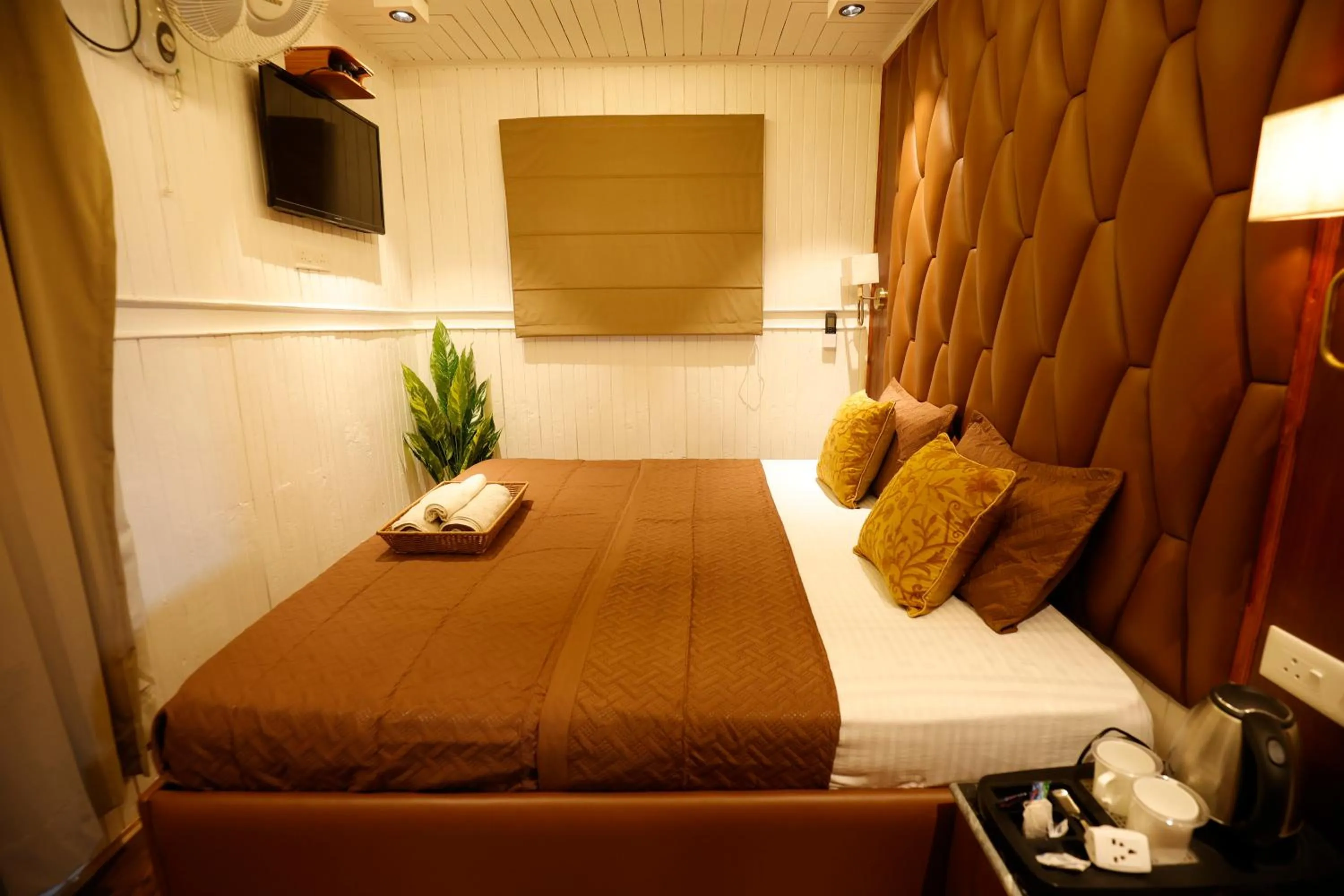 Bed in Walisons Peace Resort