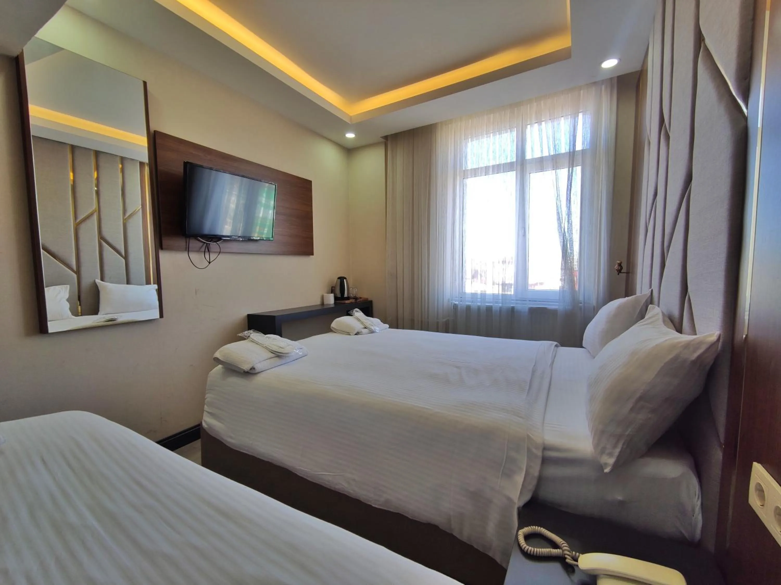 Bed in The Golden Pera's Hotel & Spa