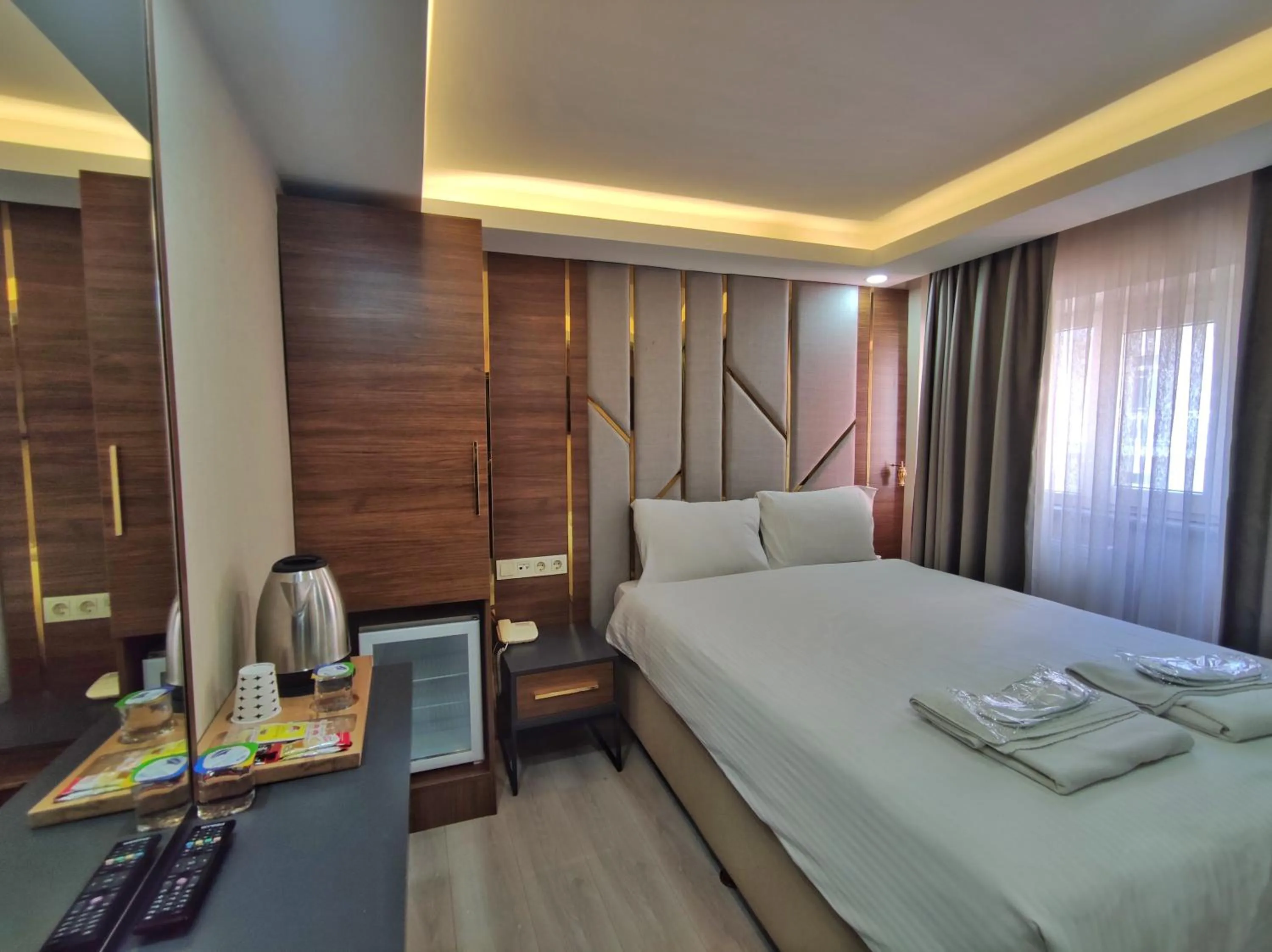 Bed in The Golden Pera's Hotel & Spa