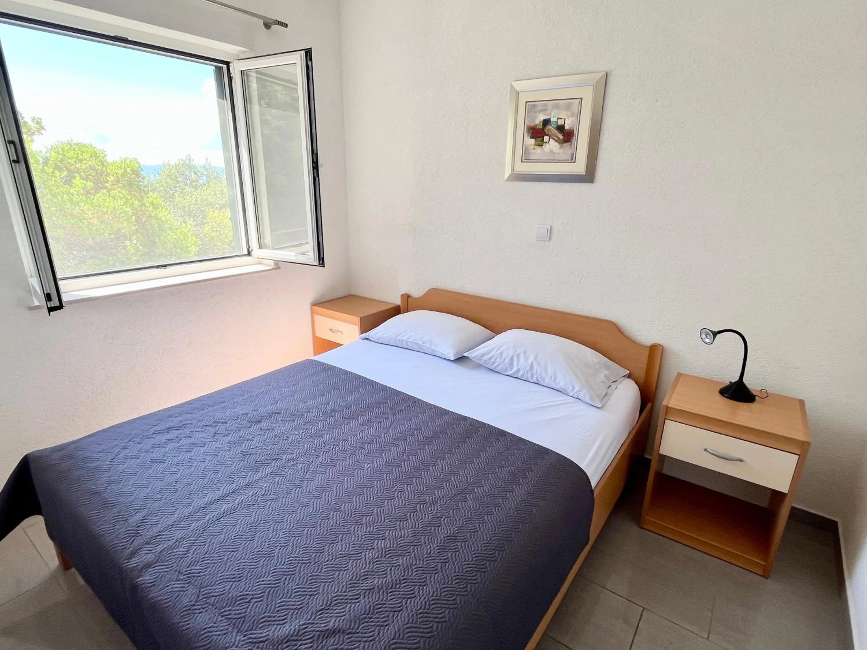 Bed in Paradise Apartments - Robinson getaway
