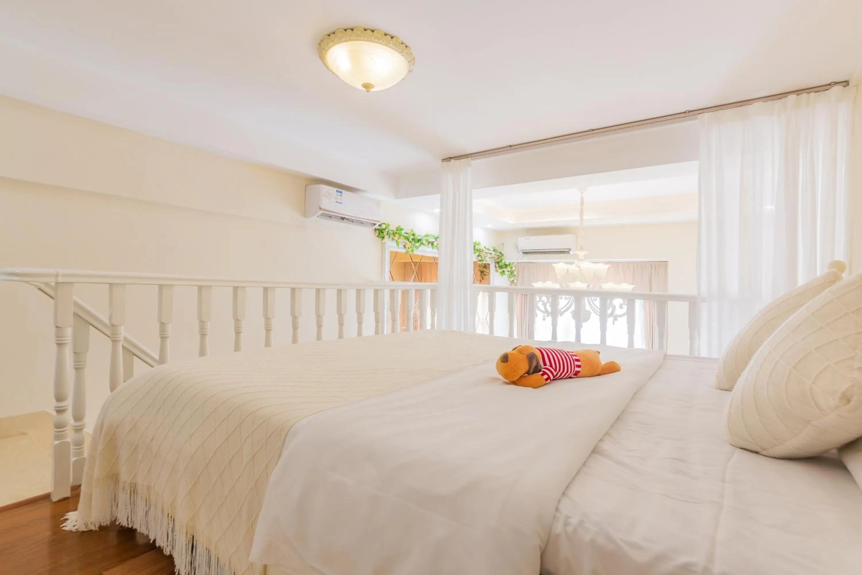 Bed in Lavender Apartment Branch