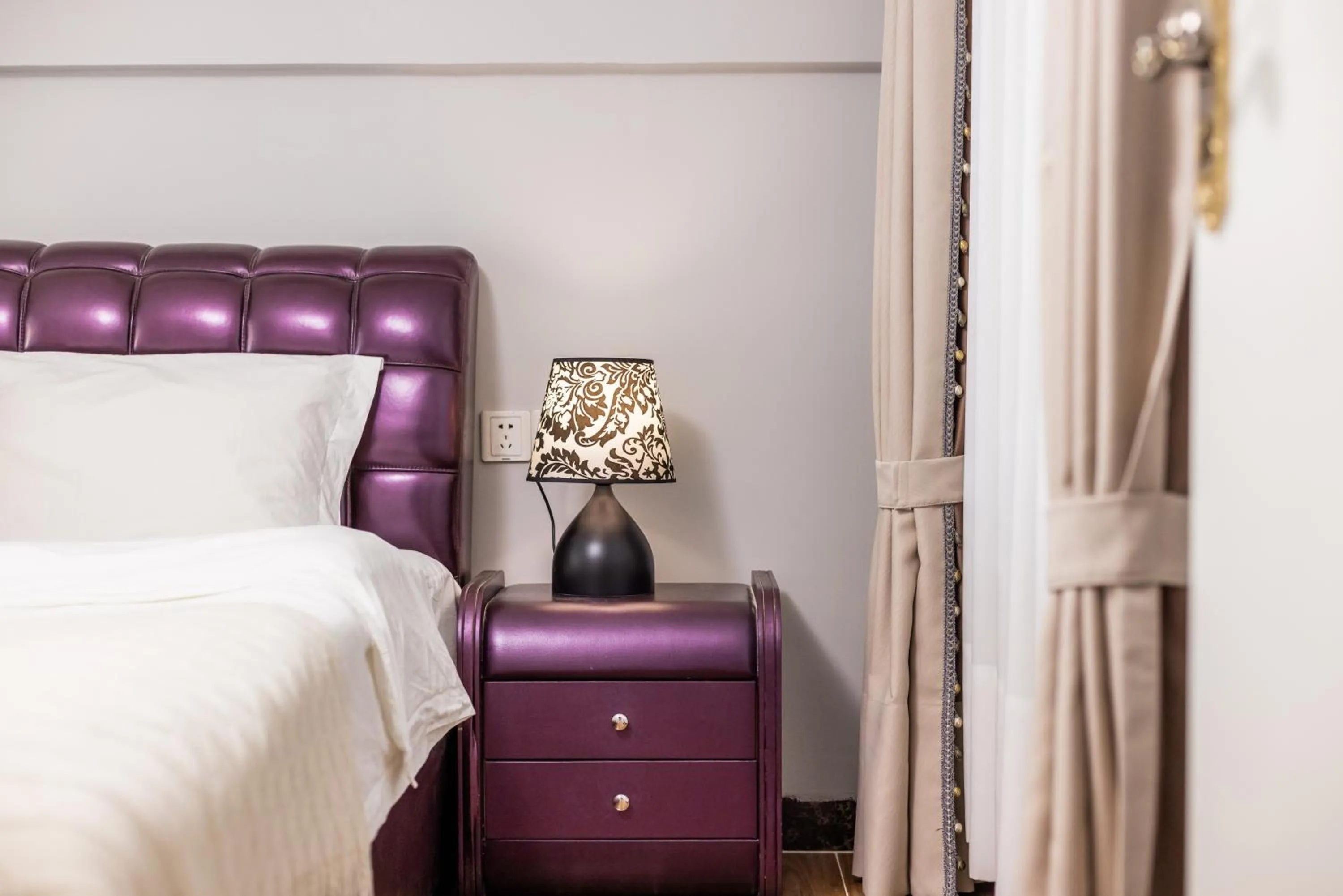 Bed in Lavender Apartment Branch