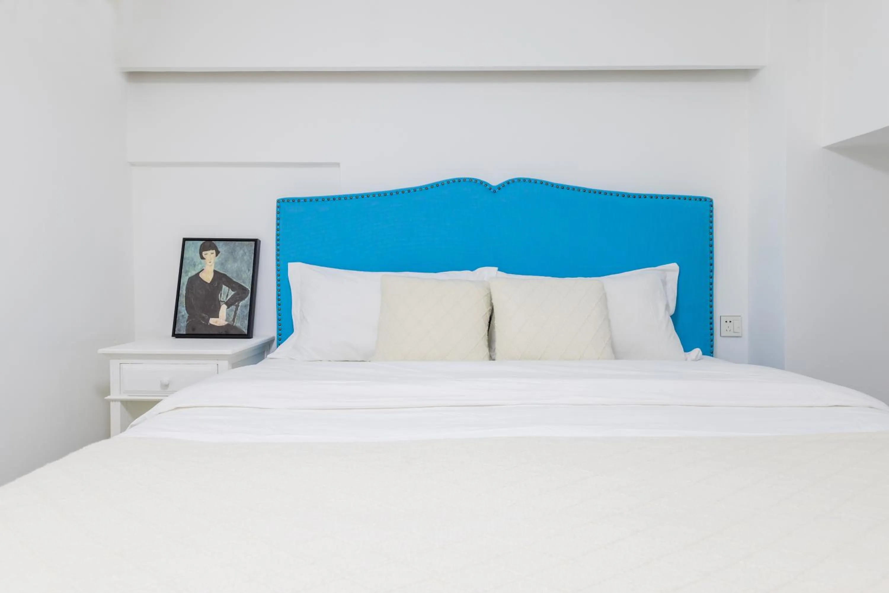 Bed in Lavender Apartment Branch