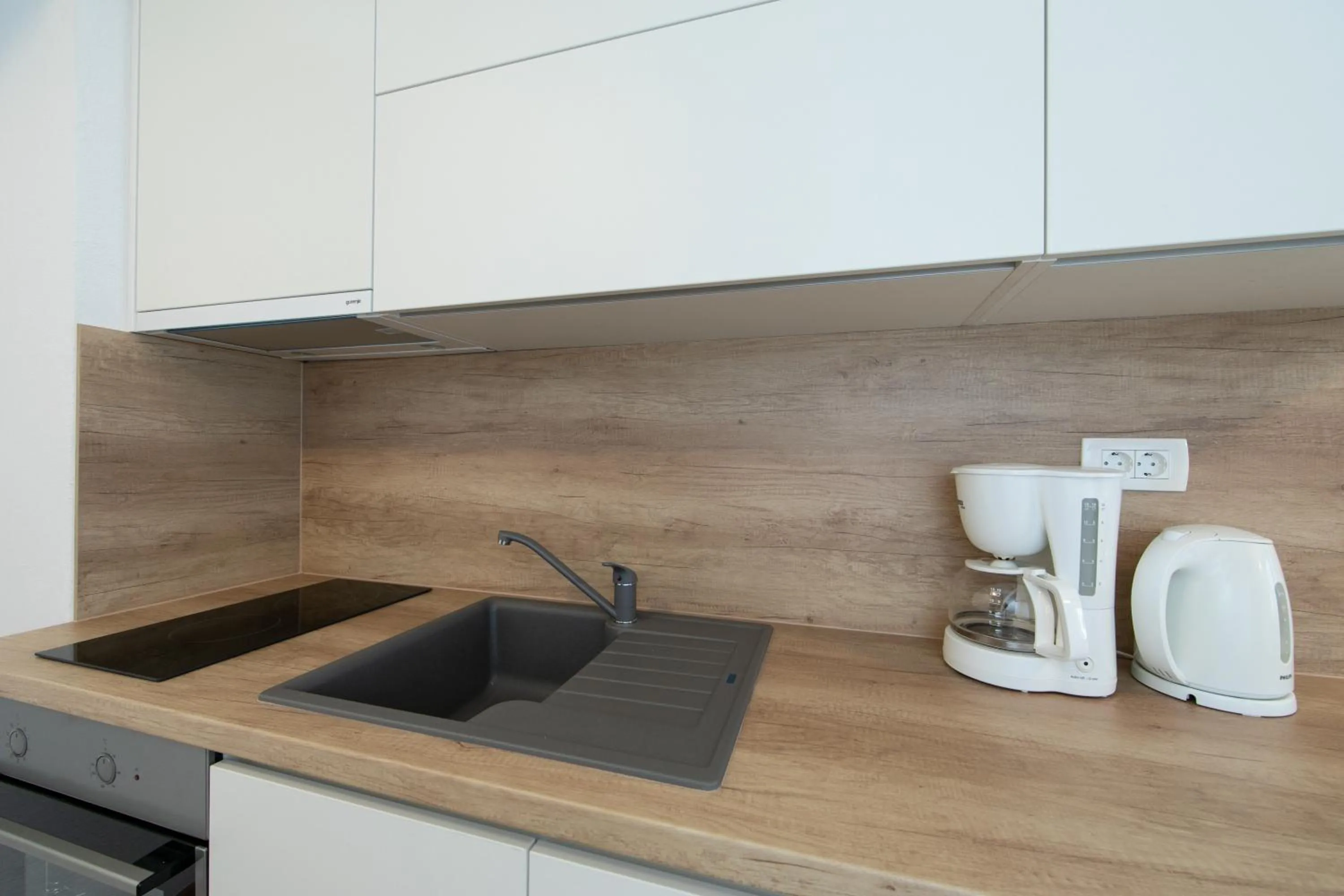 Kitchen or kitchenette in Apartments Villa Mili