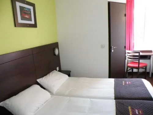 Photo of the whole room, Bed in Enzo Hotel Mulhouse Sud Morschwiller le Bas