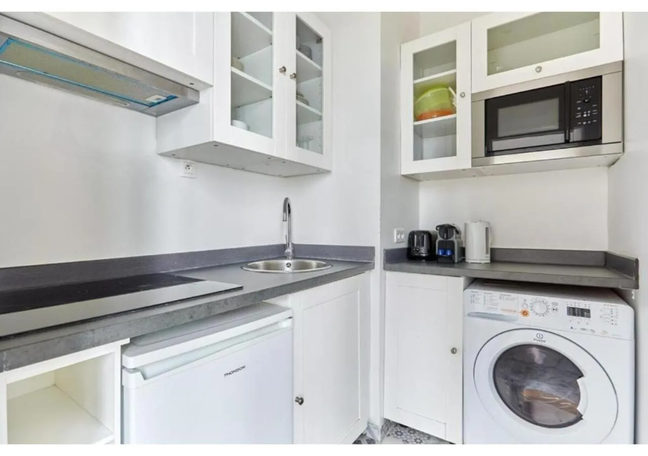 Kitchen or kitchenette in Apartment Le Marais by Studio prestige