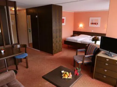 Living room, Bed in Hotel-Restaurant Seegarten-Marina