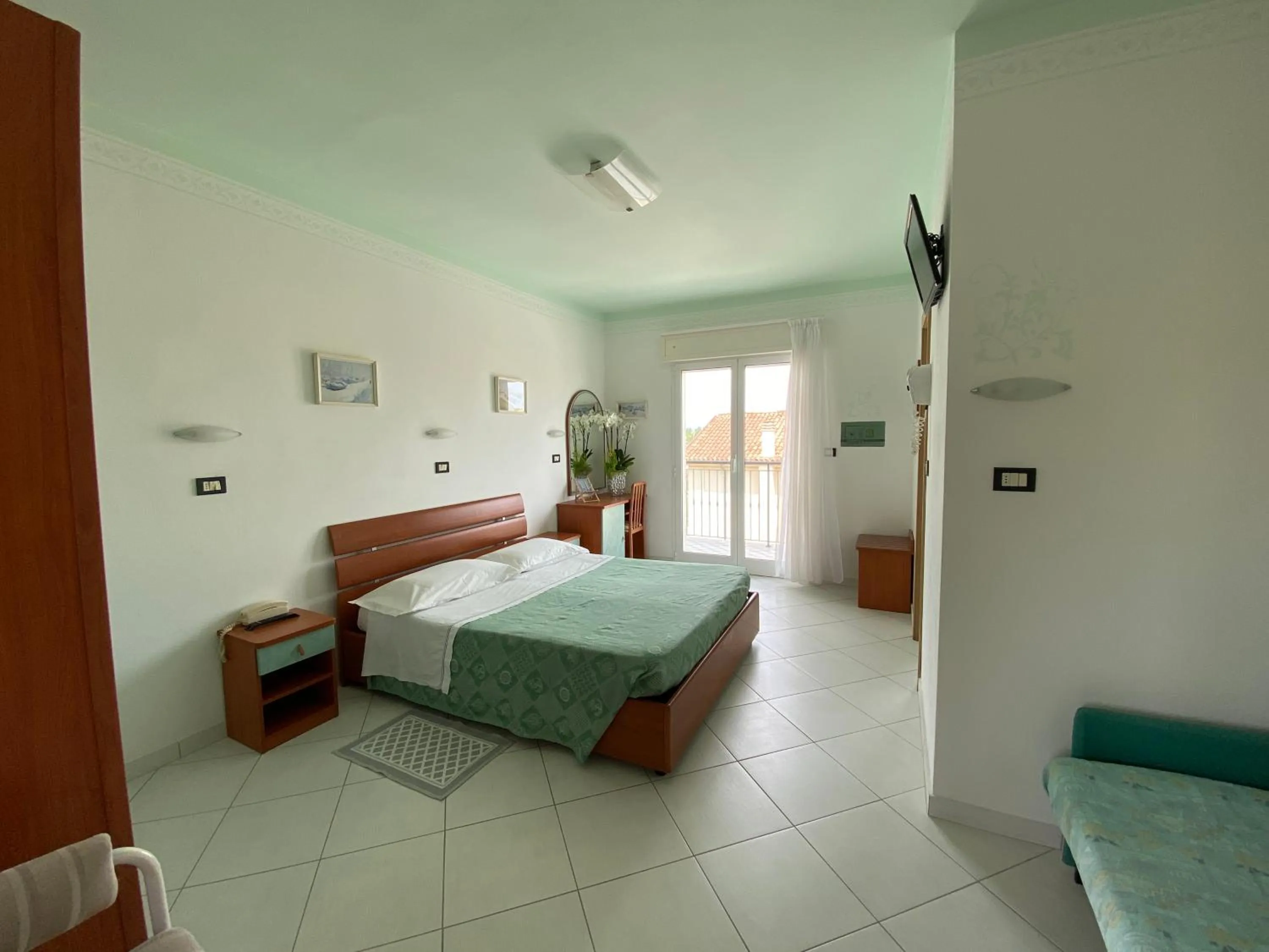 Bedroom in Hotel Capri