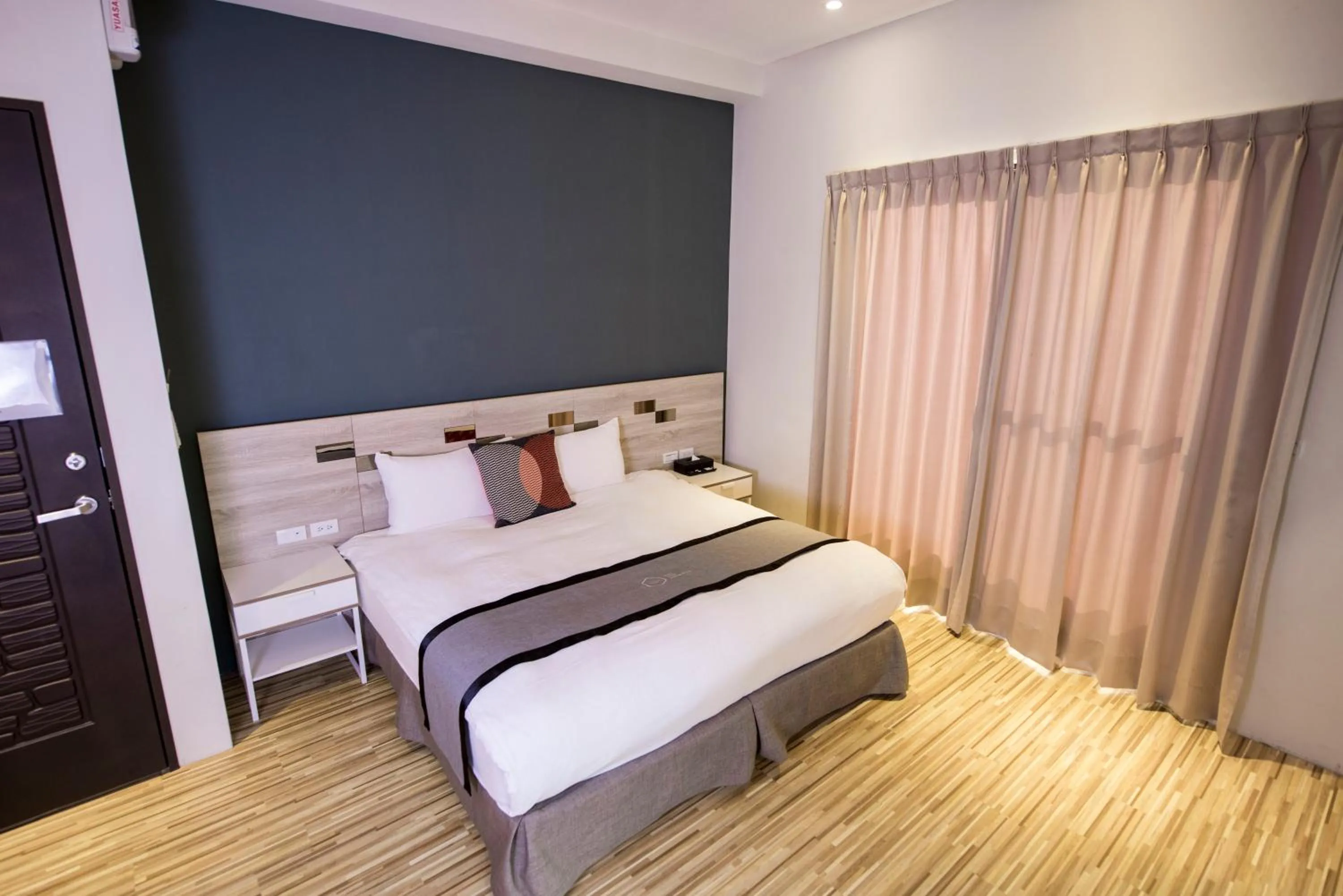 Bed in Ruo Shui Hotspring Hotel