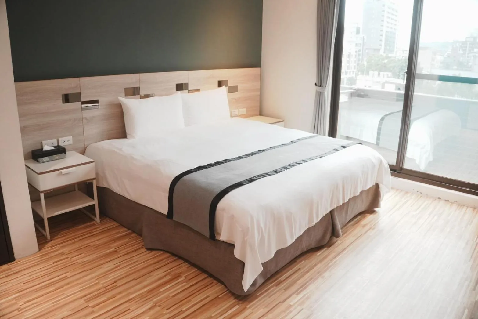 Bed in Ruo Shui Hotspring Hotel