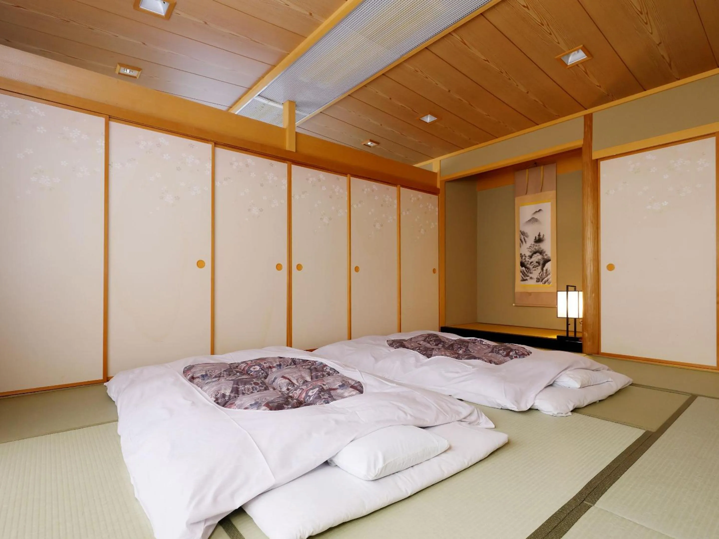 Photo of the whole room, Bed in Kanko Hotel Tamaru