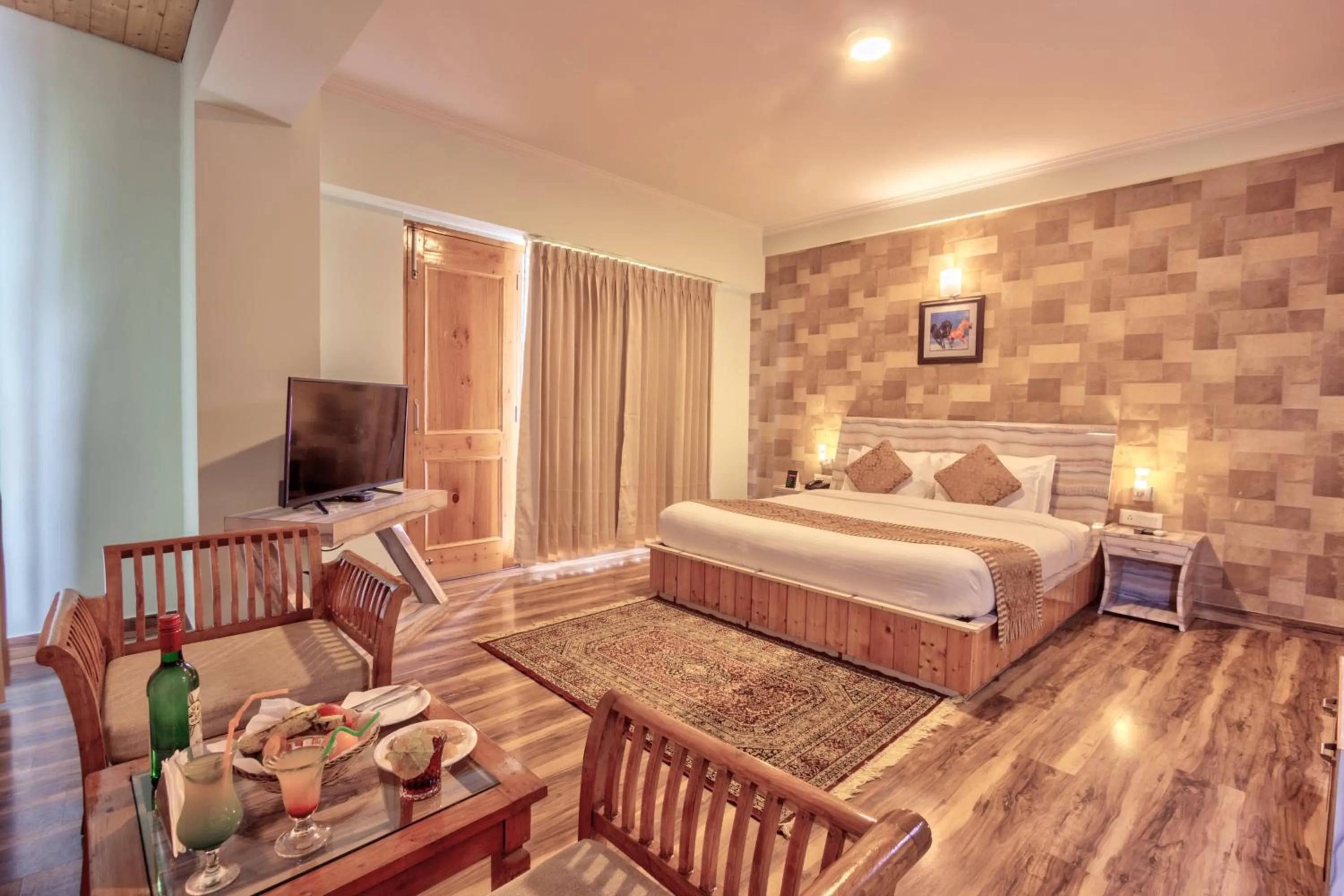 Living room, Bed in Snow Flakes Resort And Spa Centrally Heated Luxury Resort