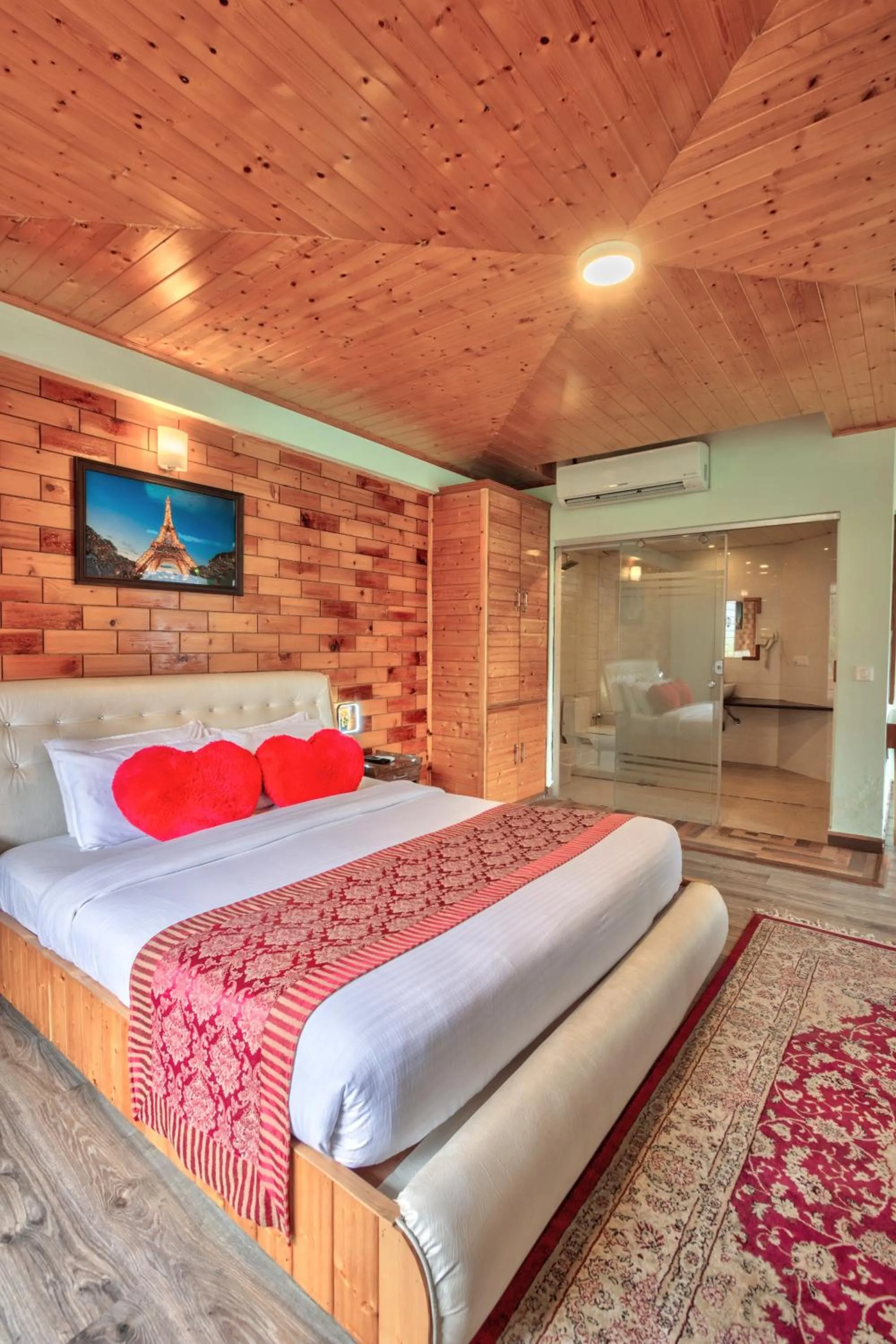 Bed in Snow Flakes Resort And Spa Centrally Heated Luxury Resort