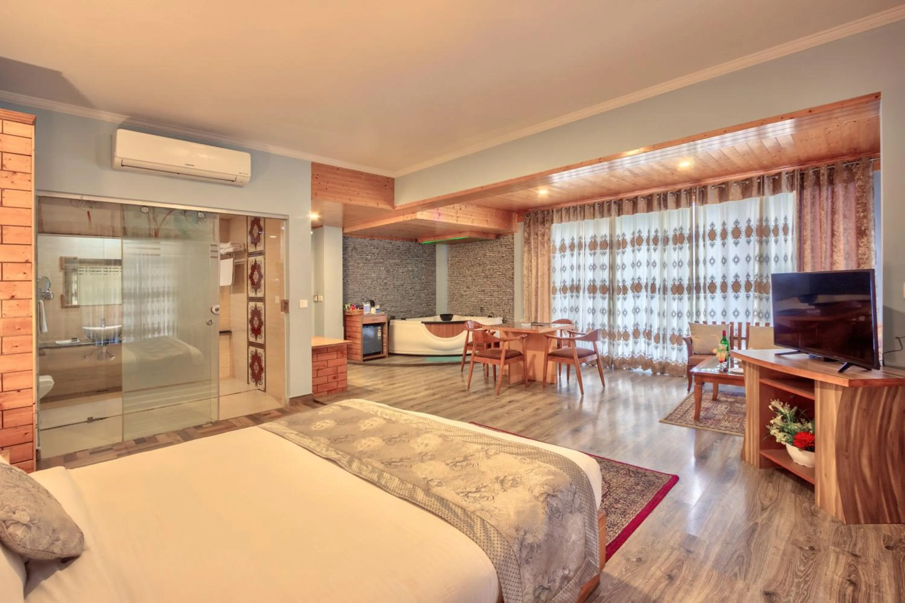 Living room, Bed in Snow Flakes Resort And Spa Centrally Heated Luxury Resort