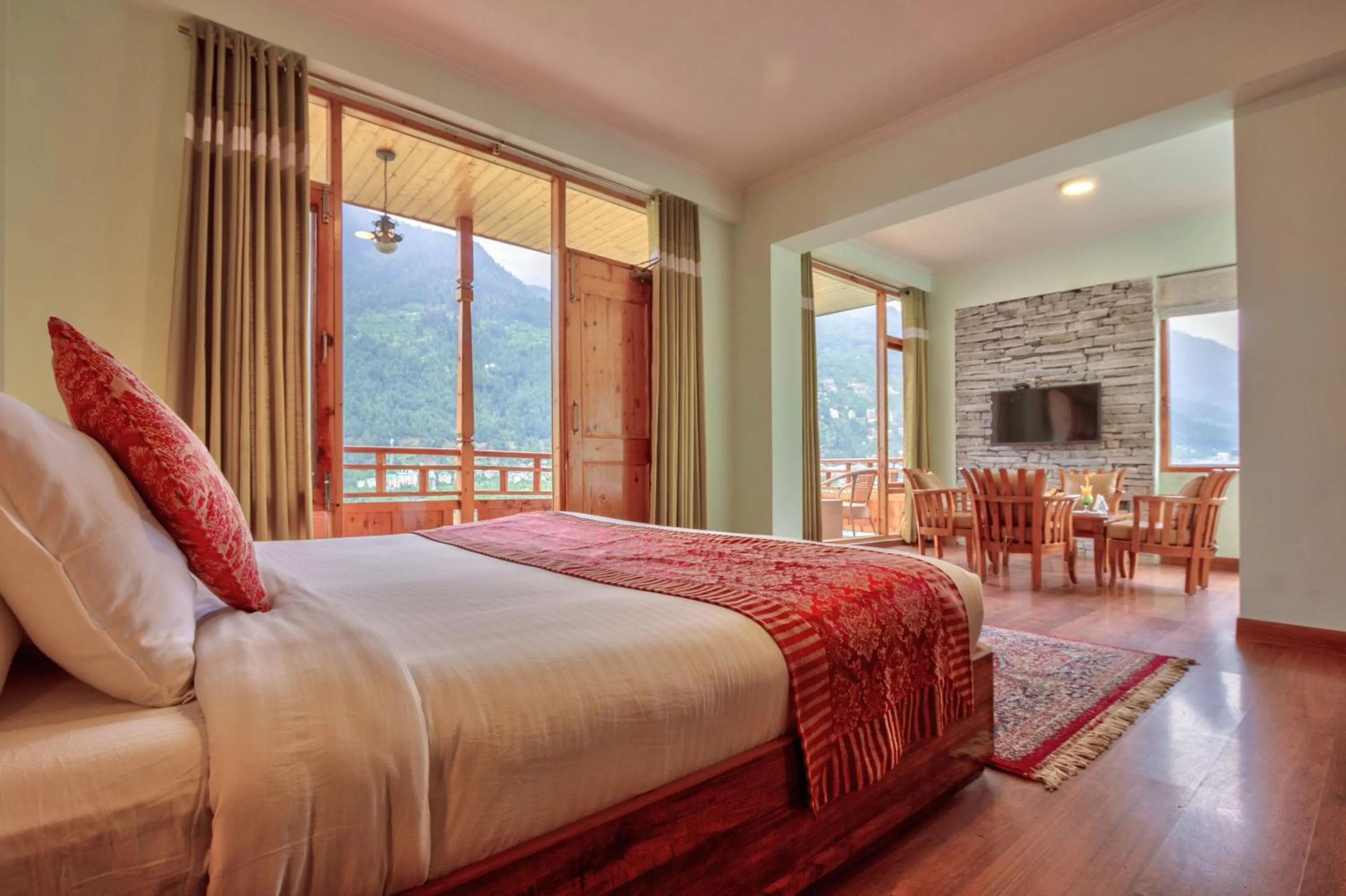 Bed in Snow Flakes Resort And Spa Centrally Heated Luxury Resort