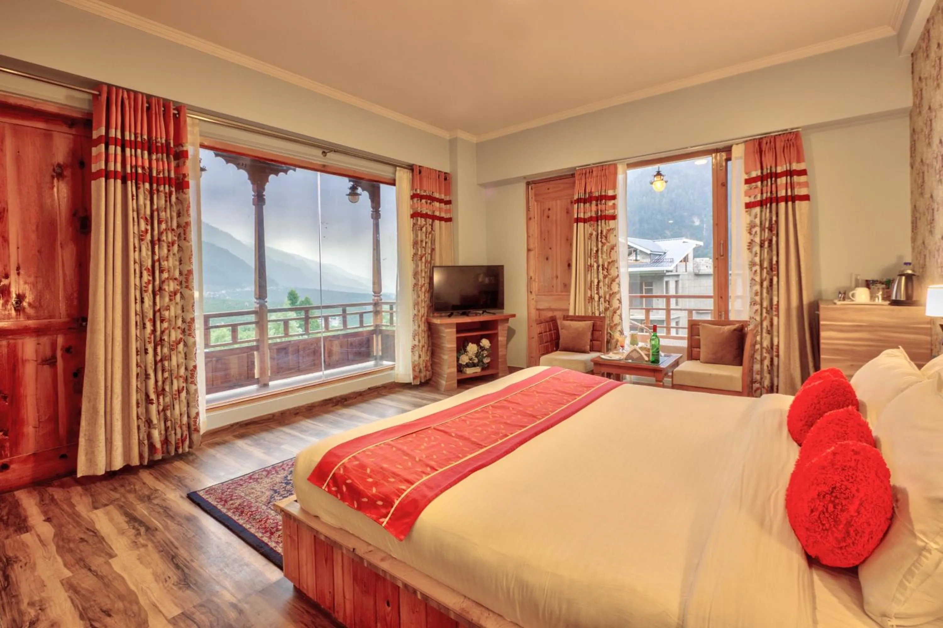 Bedroom, Bed in Snow Flakes Resort And Spa Centrally Heated Luxury Resort