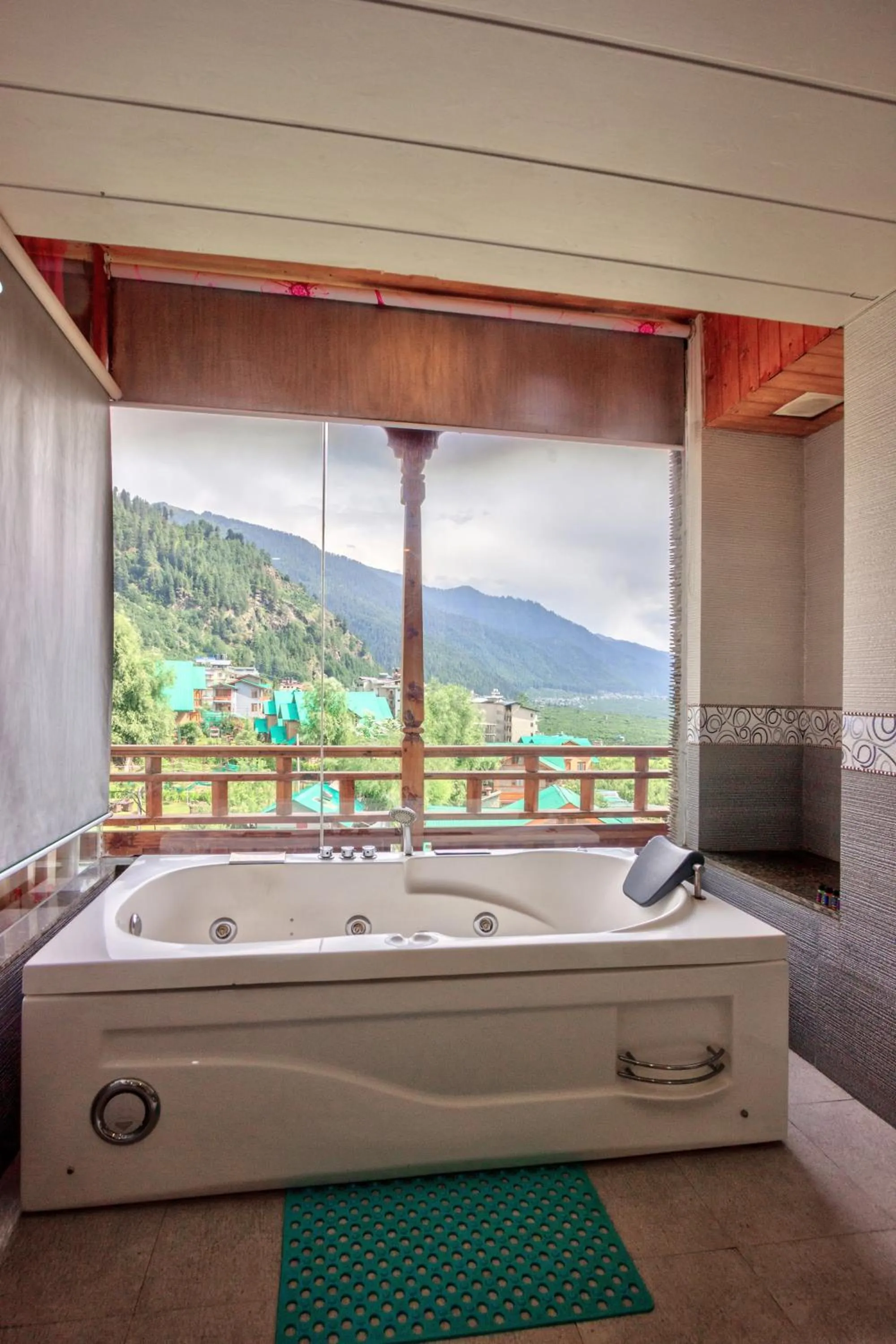 Bath in Snow Flakes Resort And Spa Centrally Heated Luxury Resort