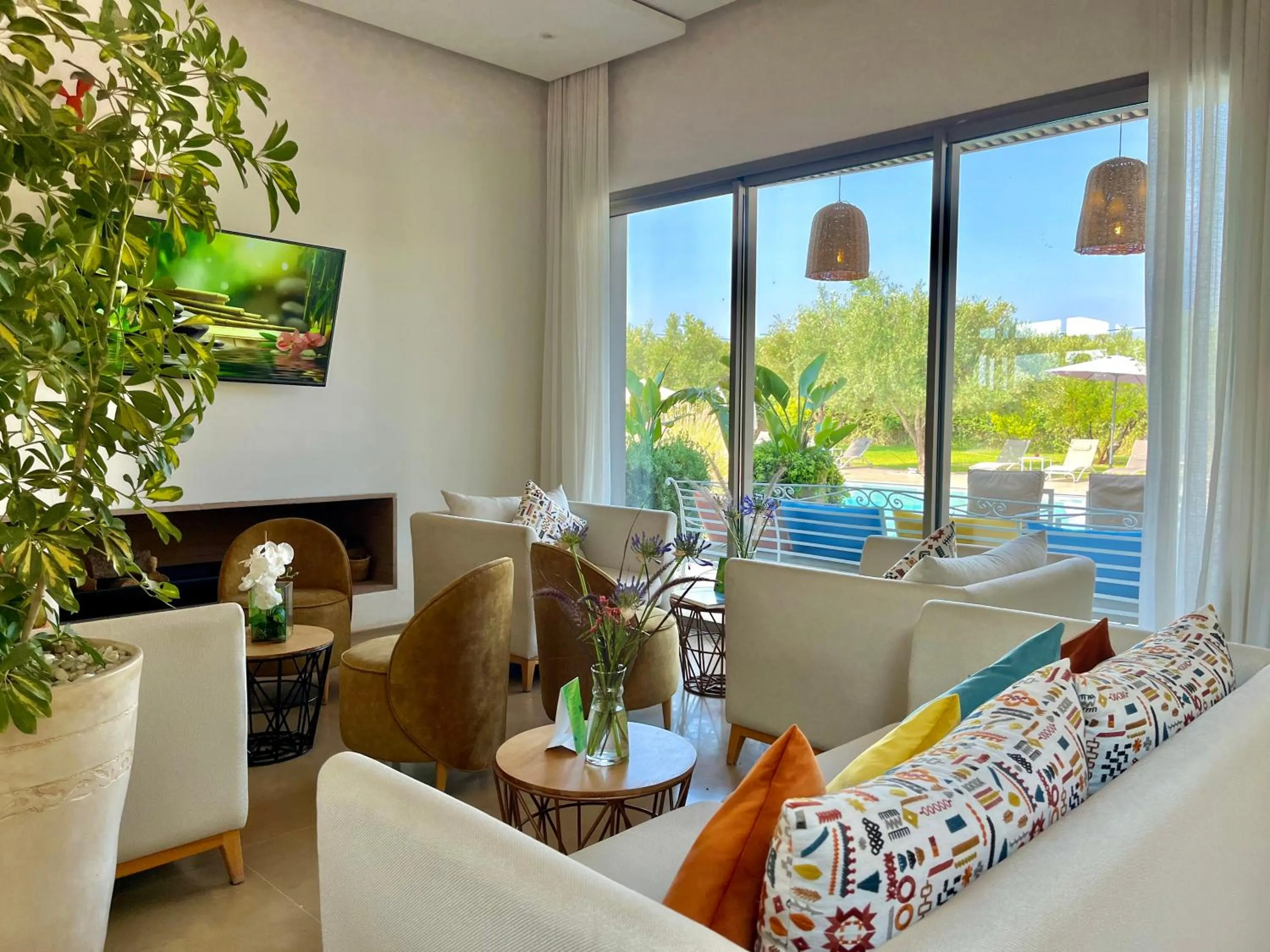 Communal lounge/ TV room in Villa Jardins D'Isa