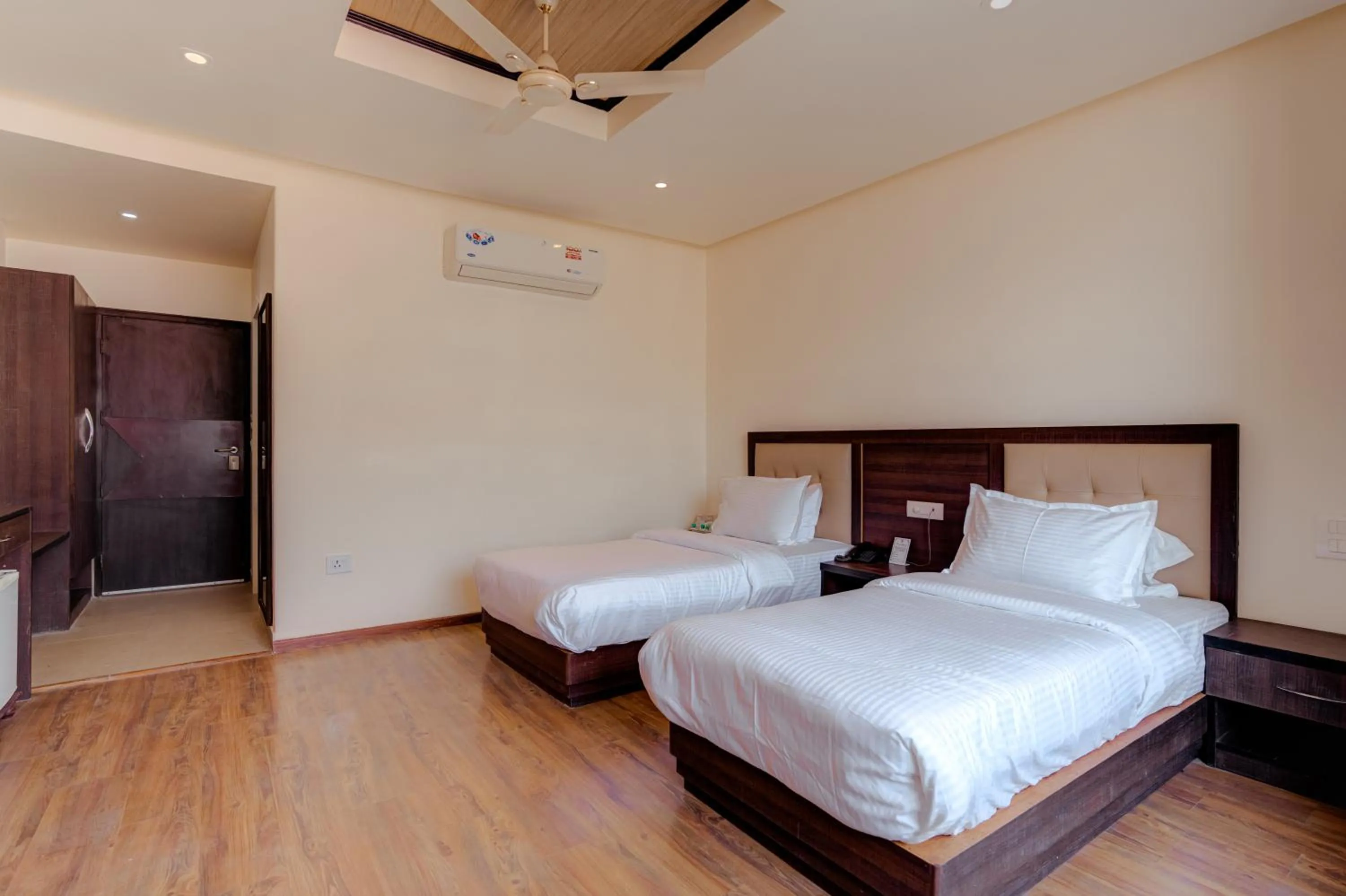 Bed in Hotel Vasundhara Palace