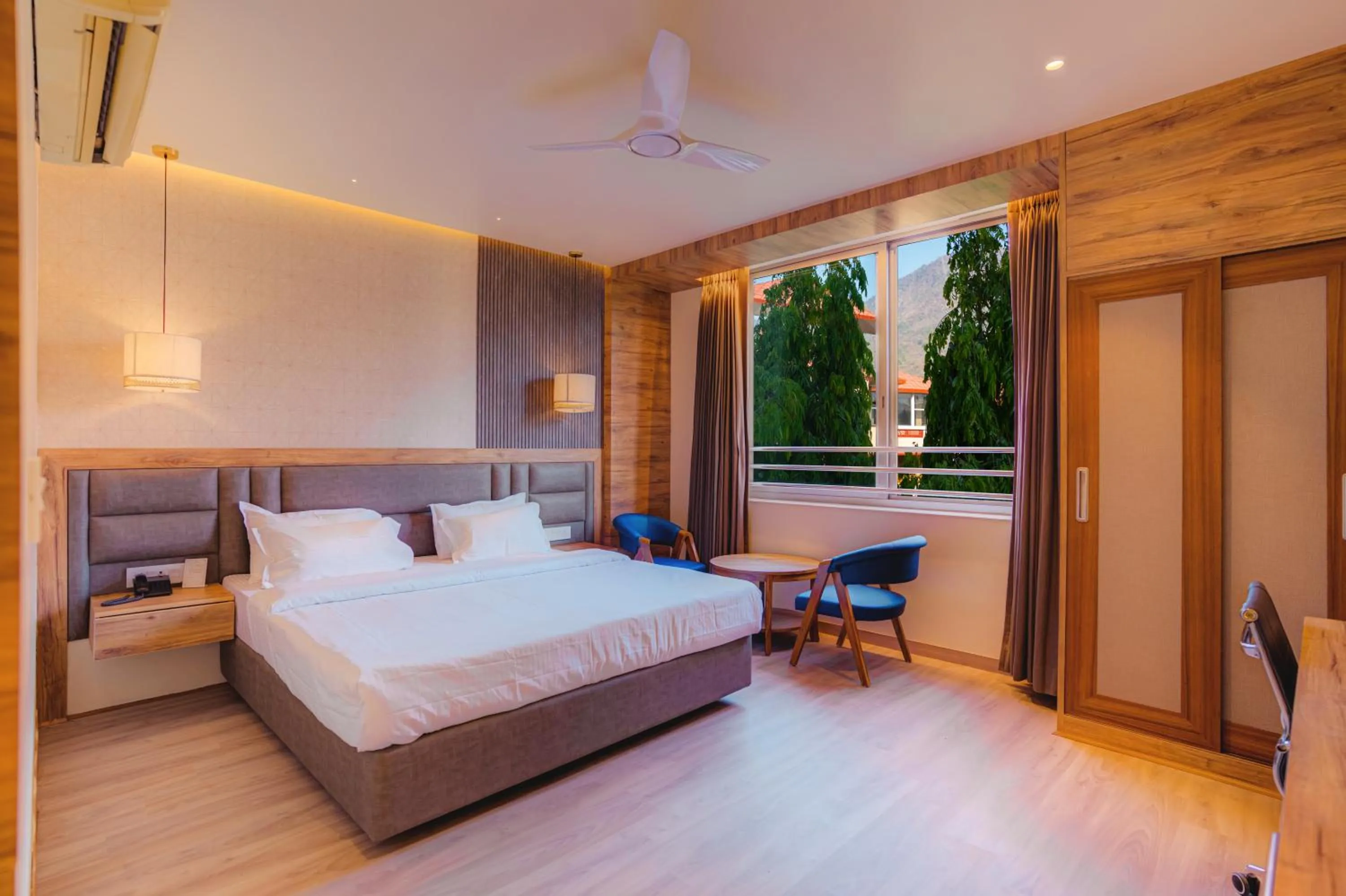 Bed in Hotel Vasundhara Palace