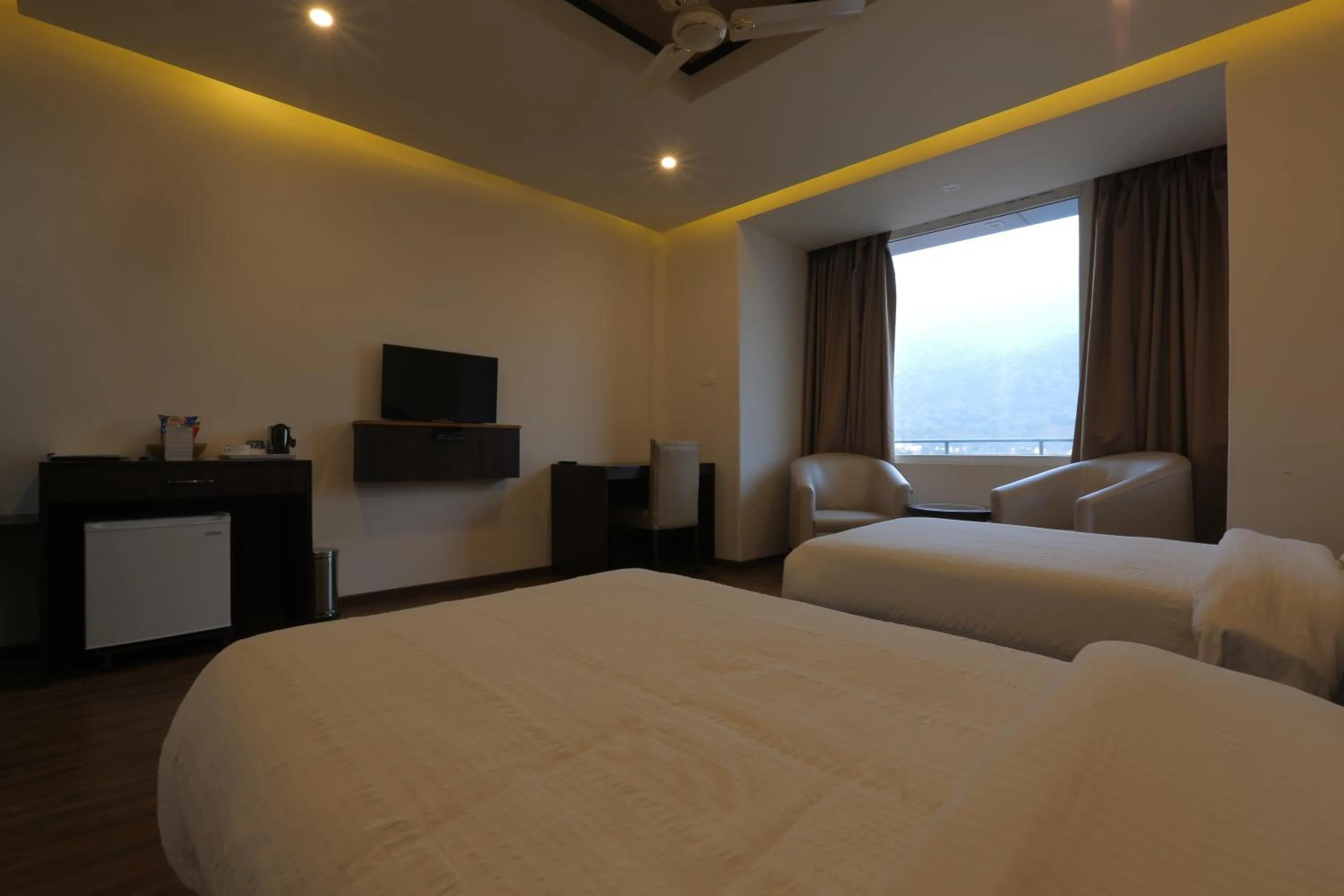 Bed in Hotel Vasundhara Palace