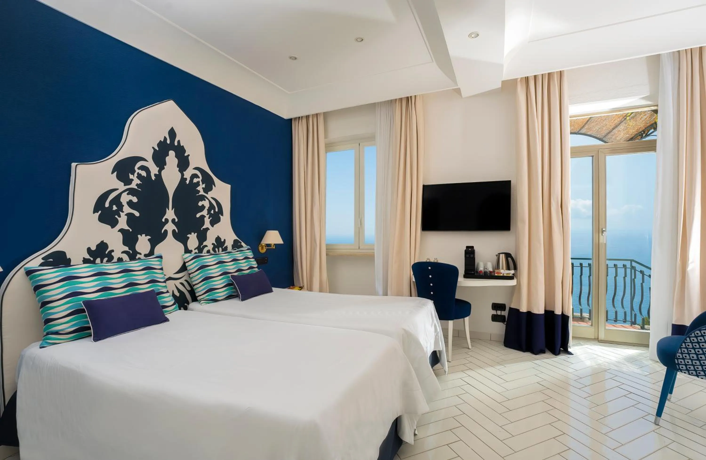 Bed in Hotel Le Agavi