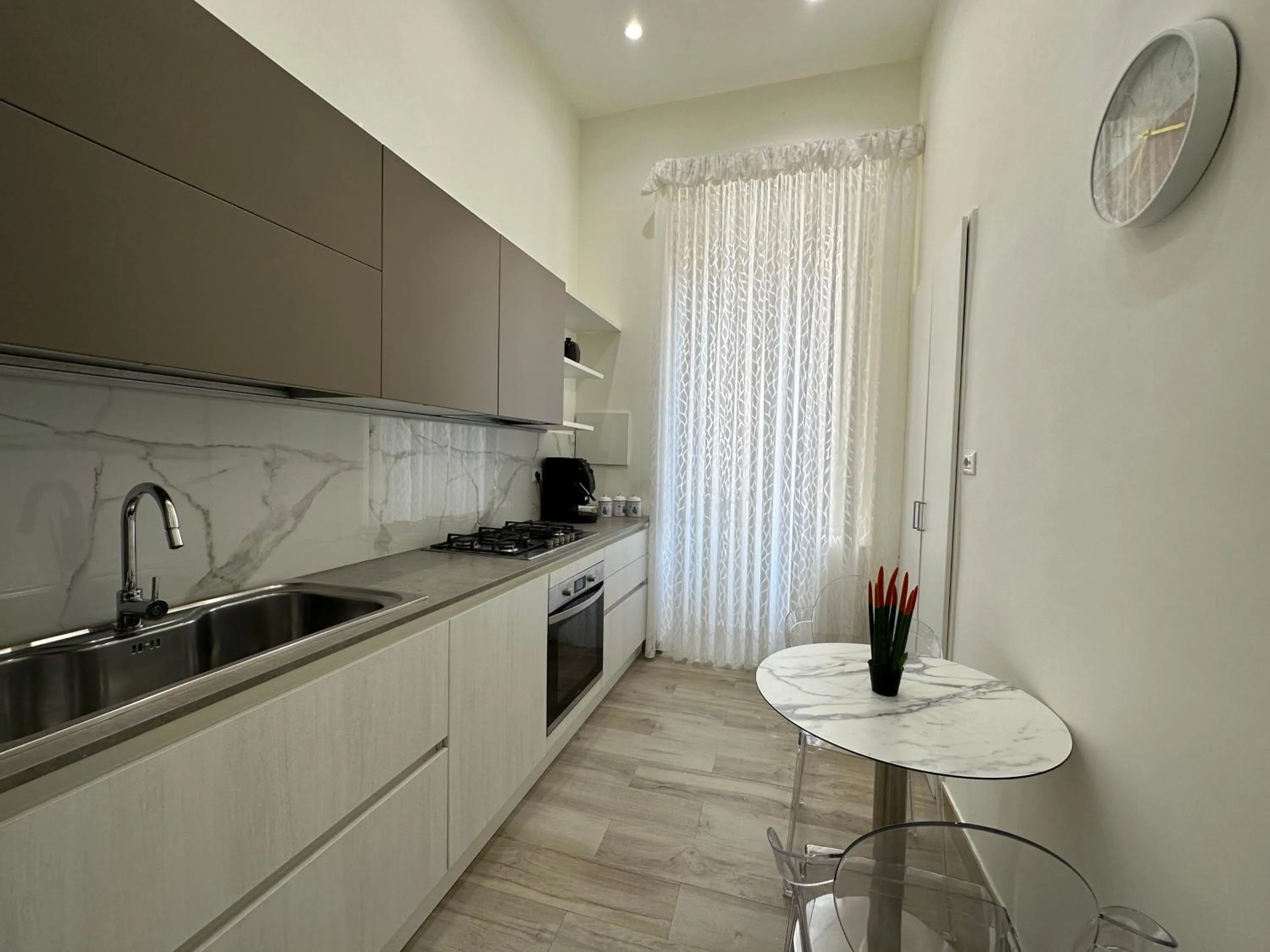 Kitchen or kitchenette in Sun Art Naples Rooms