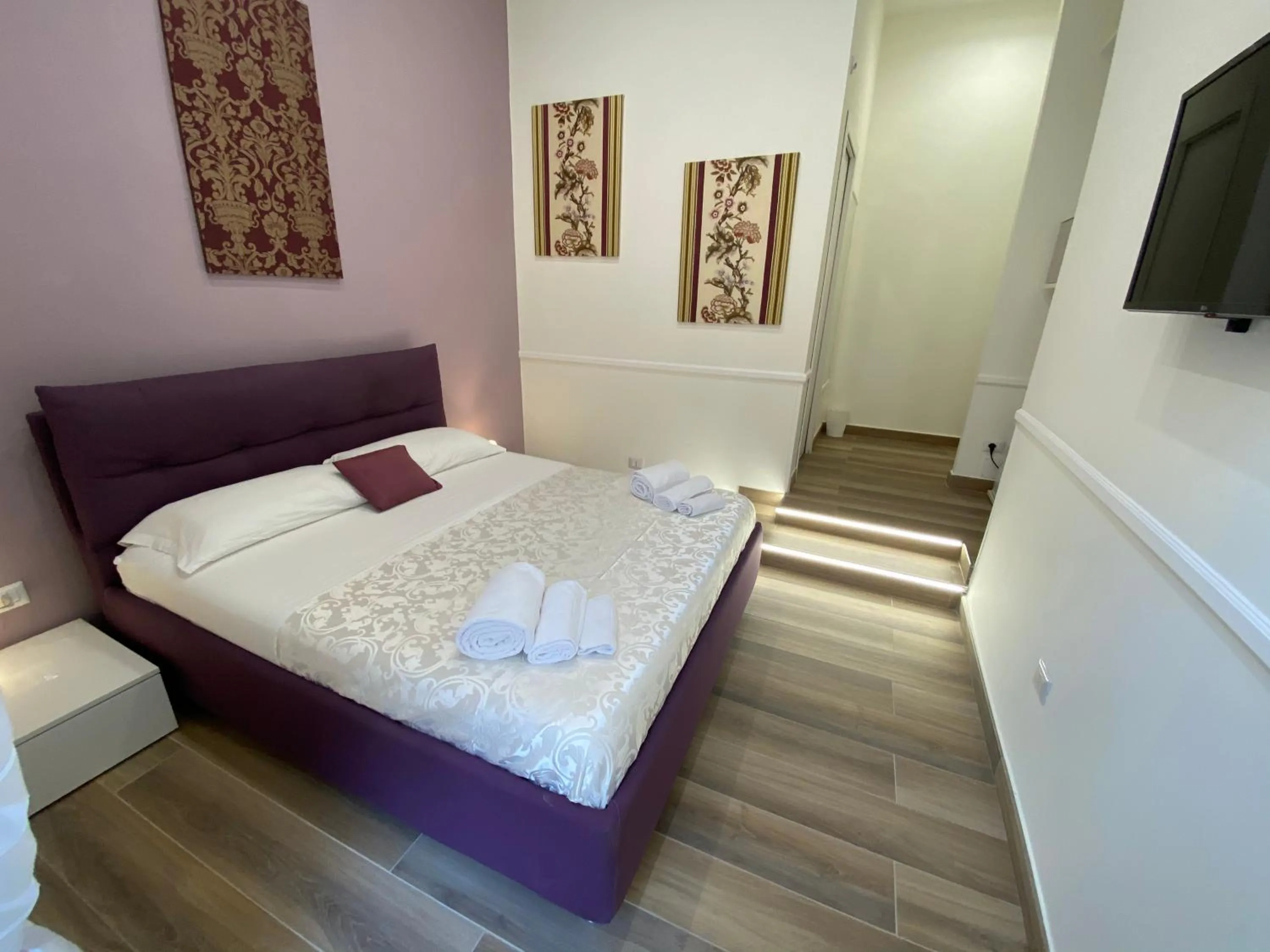 Photo of the whole room, Bed in Sun Art Naples Rooms