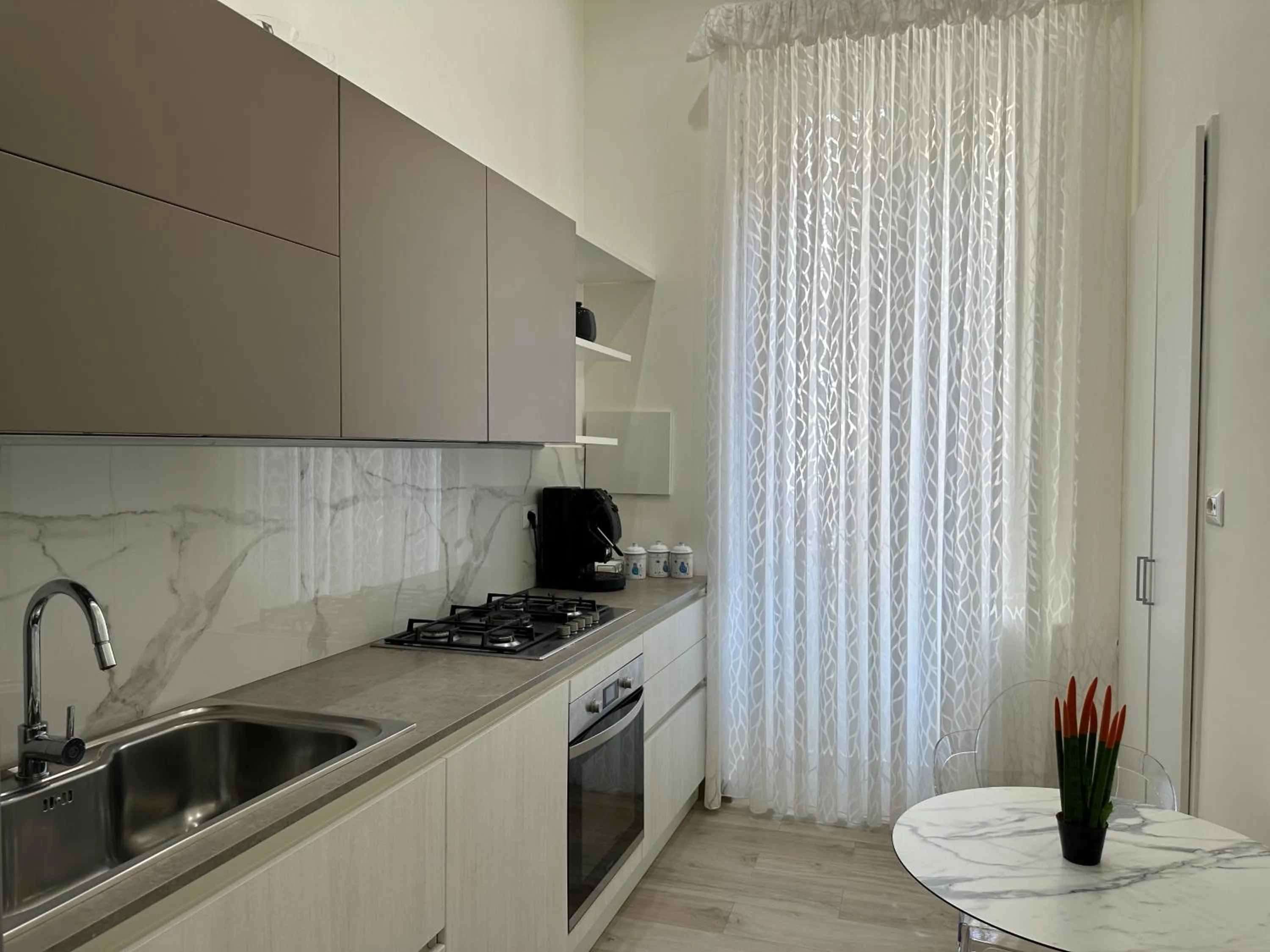 Kitchen or kitchenette in Sun Art Naples Rooms