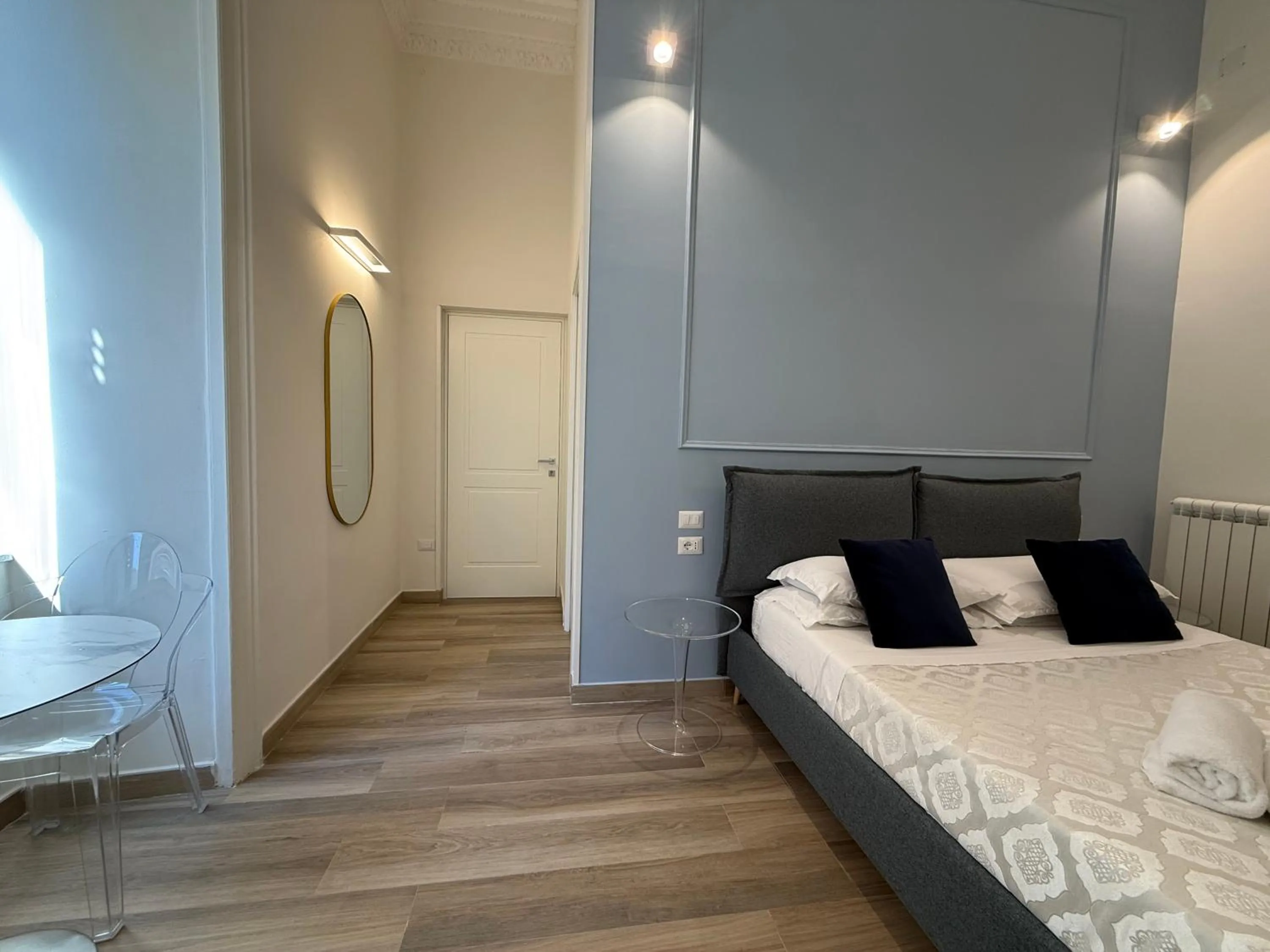 Bed in Sun Art Naples Rooms