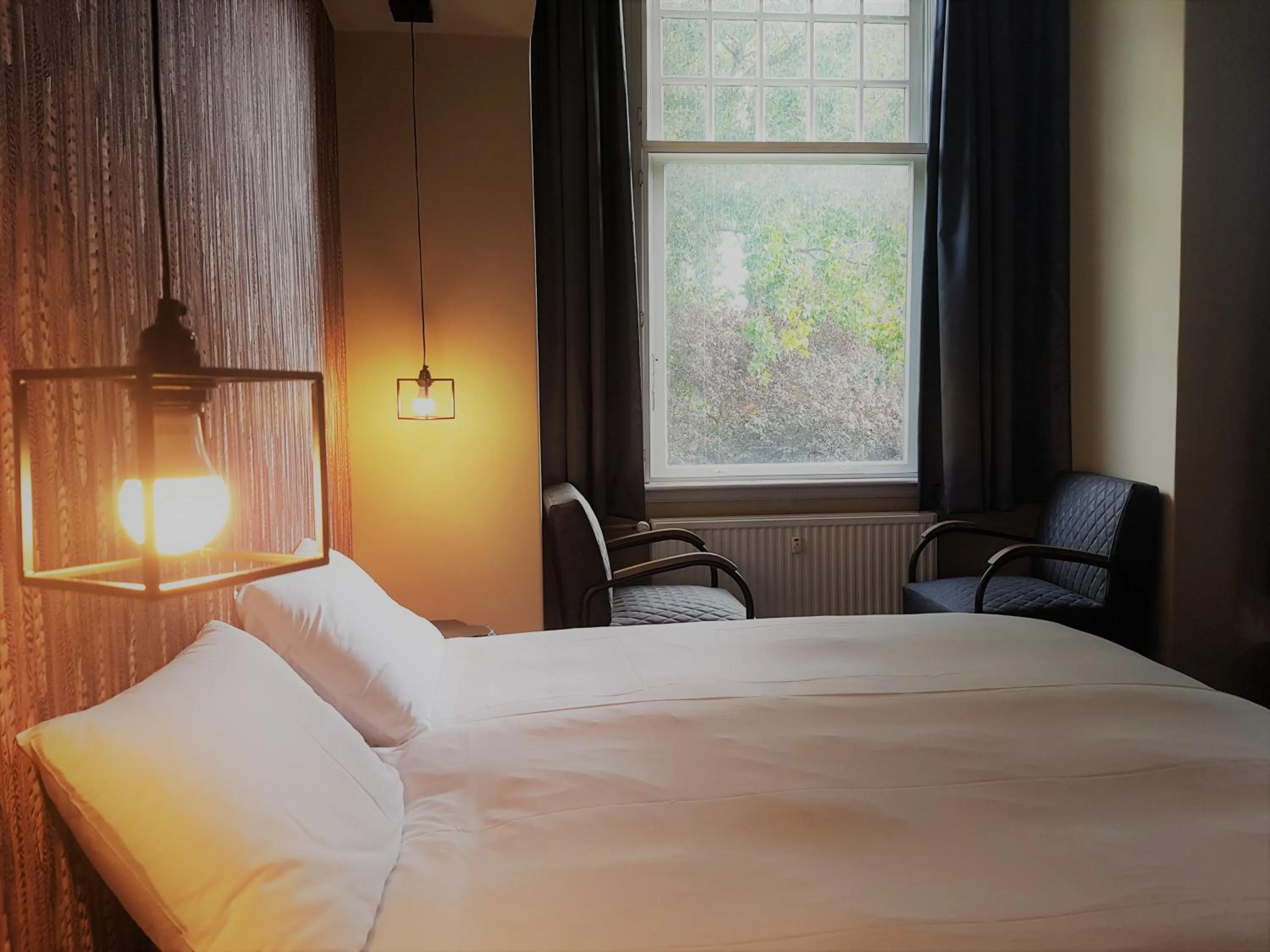 Bedroom, Bed in Rijksmonument Hotel de Sprenck - including free private parking