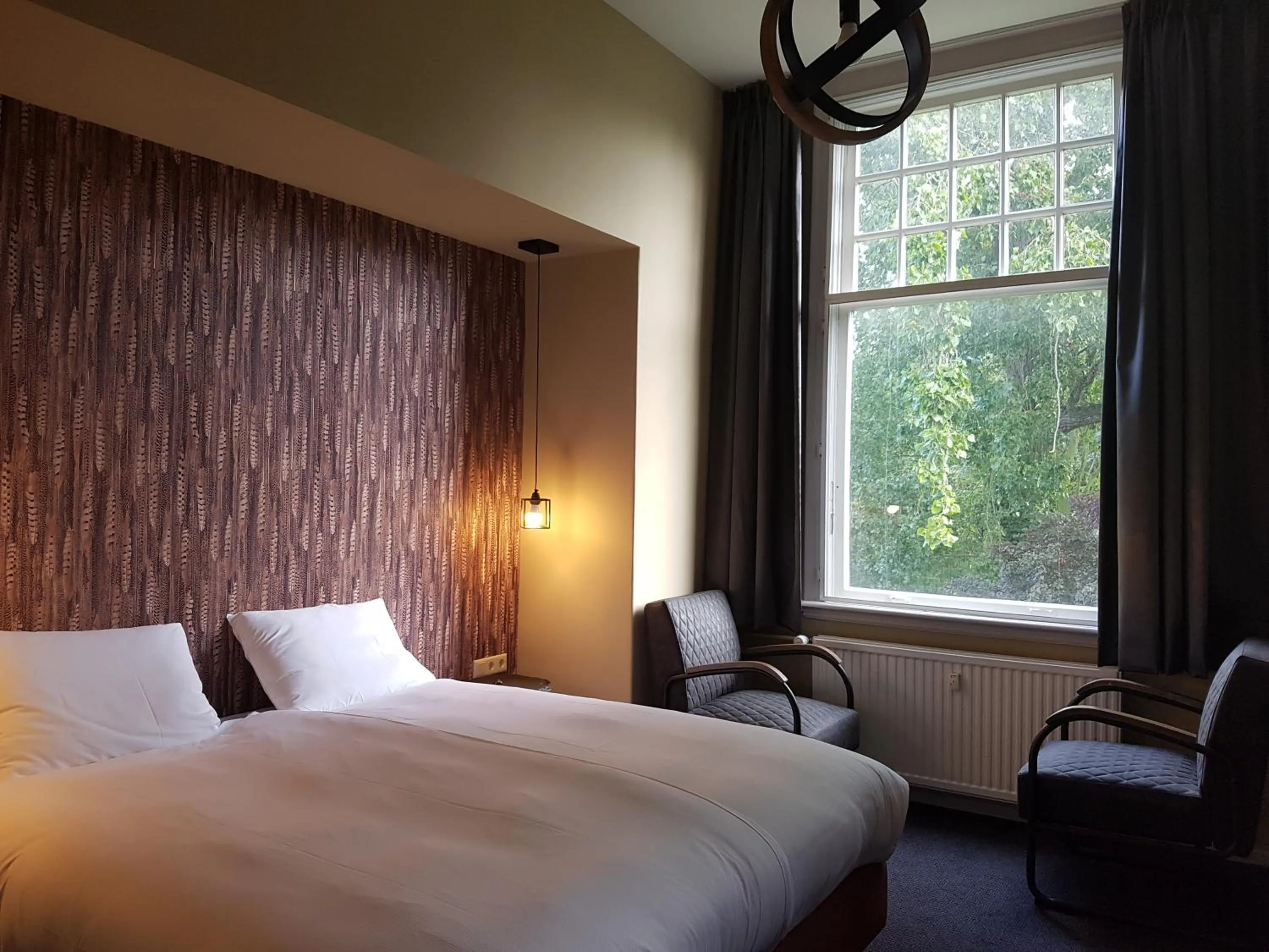 Bedroom, Bed in Rijksmonument Hotel de Sprenck - including free private parking